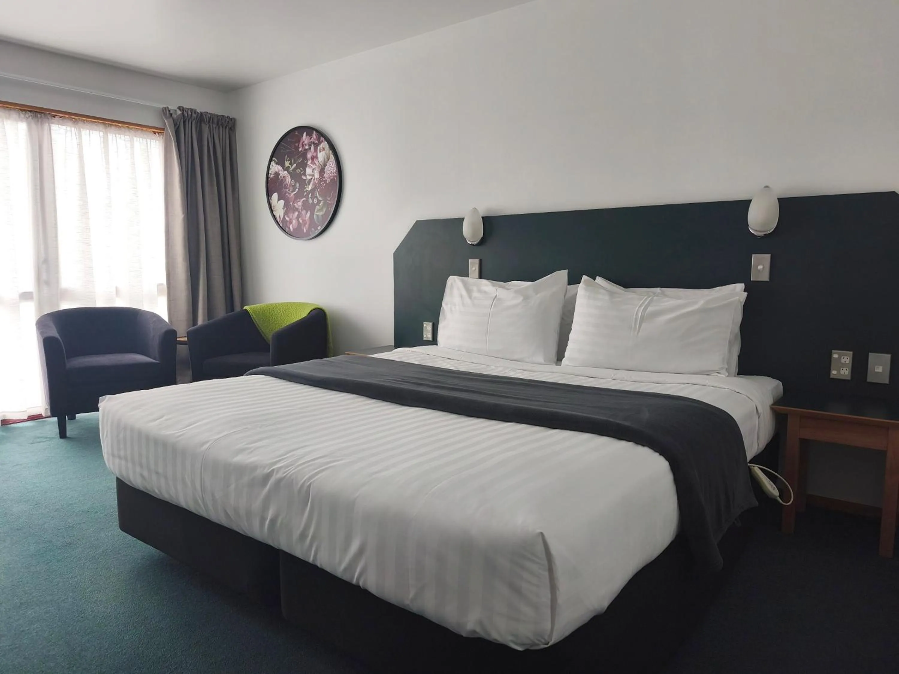 Bed in Aspen Lodge Motel