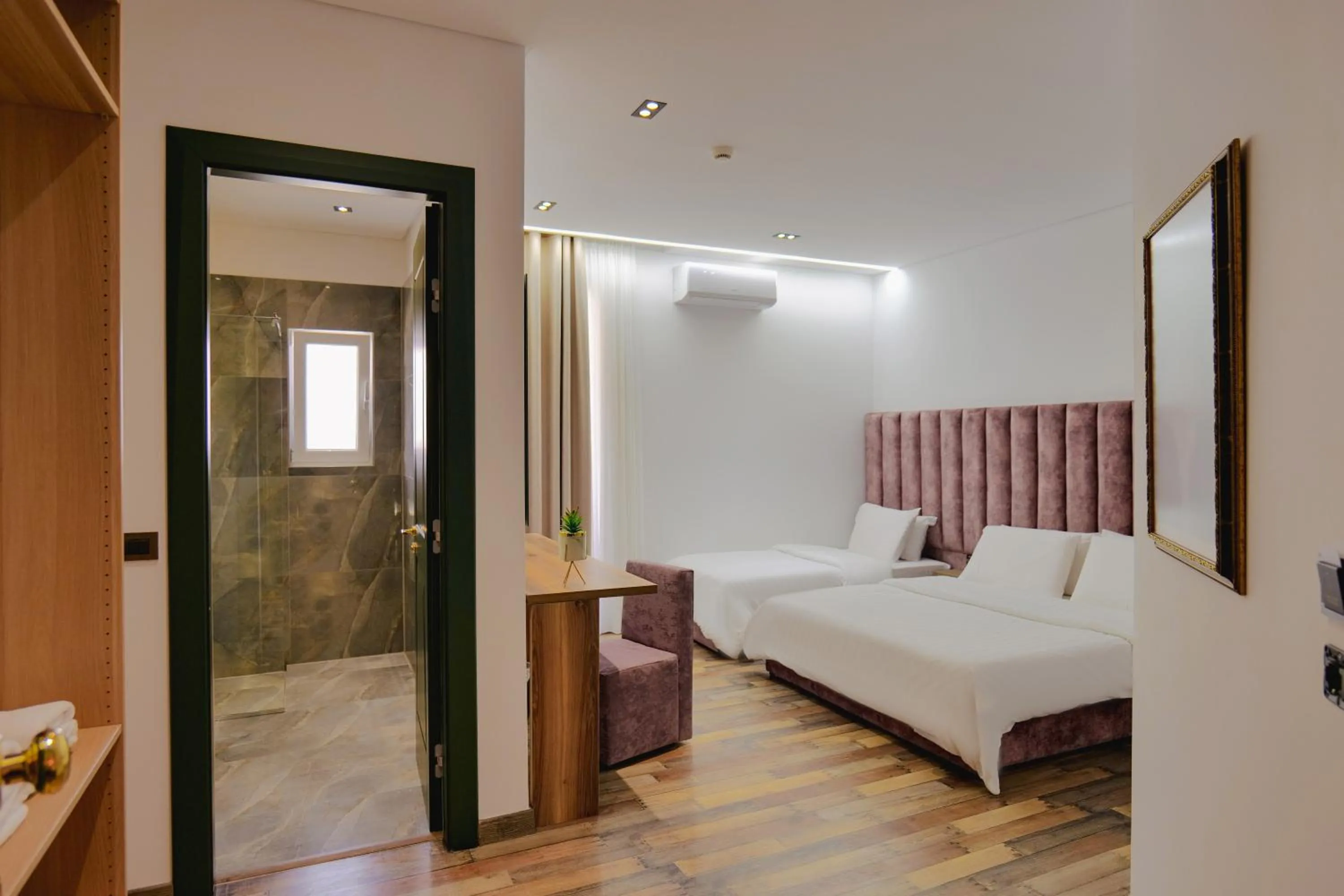 Bed in Asi Rooftop Hotel