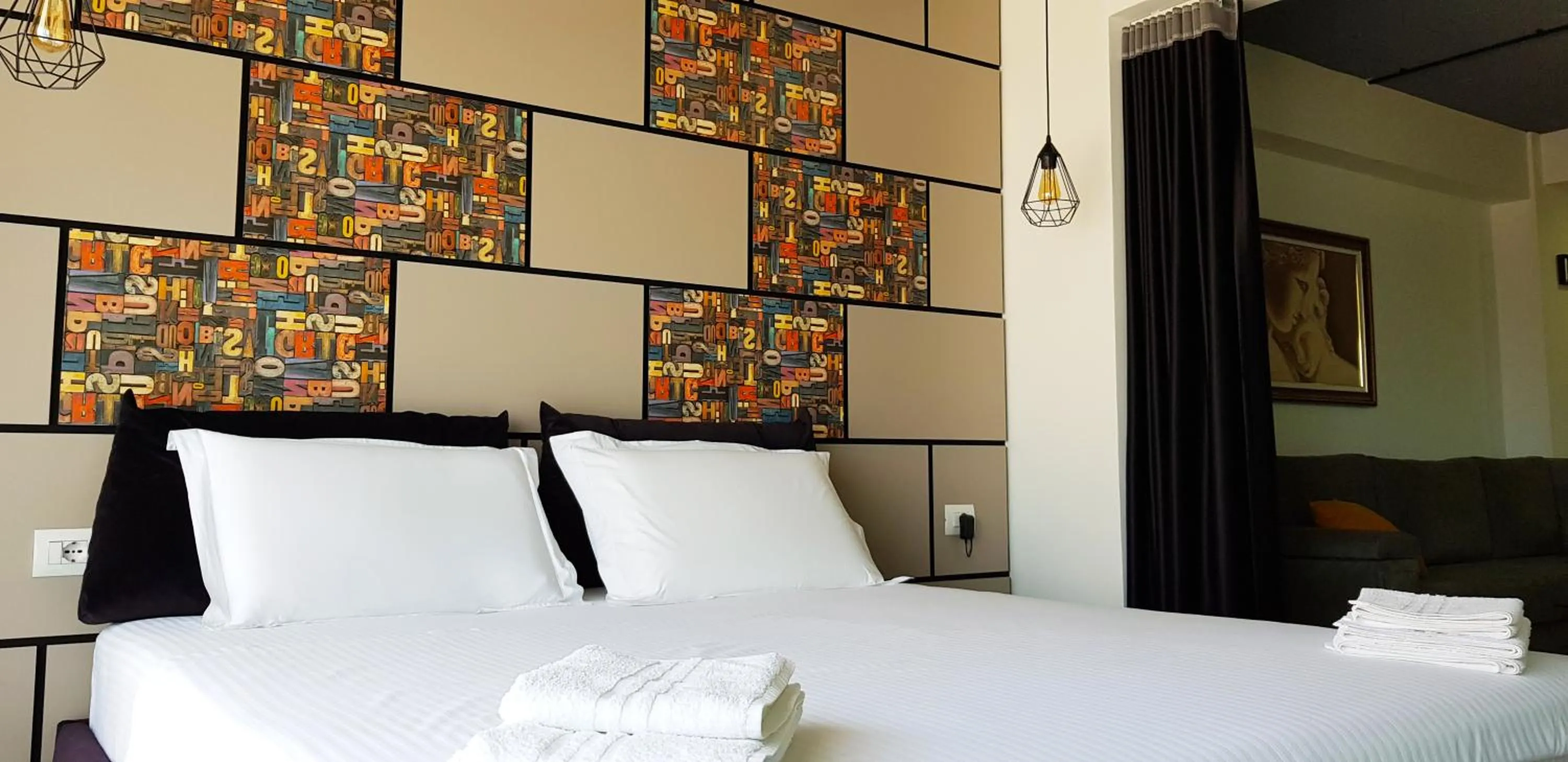 Bed in Asi Rooftop Hotel