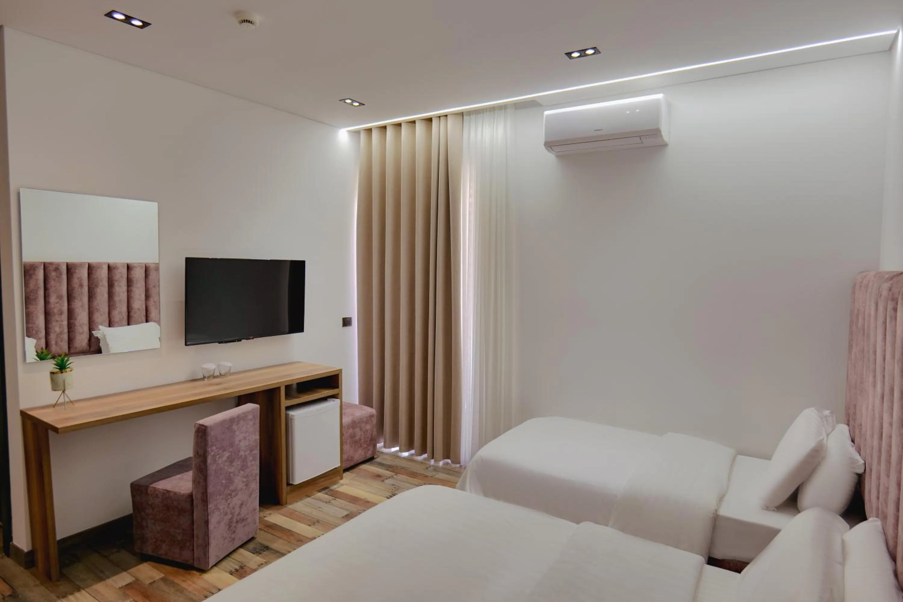 Bed in Asi Rooftop Hotel