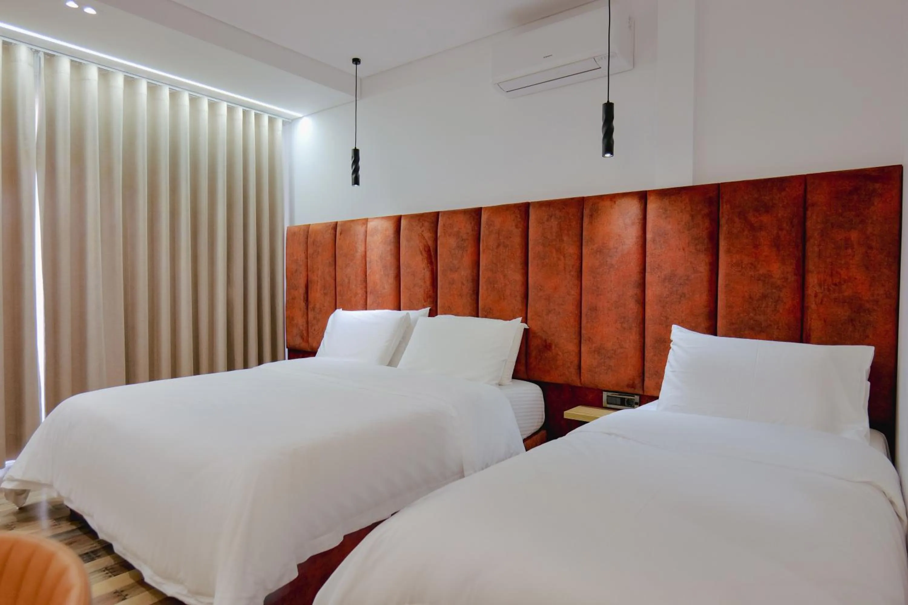 Bed in Asi Rooftop Hotel