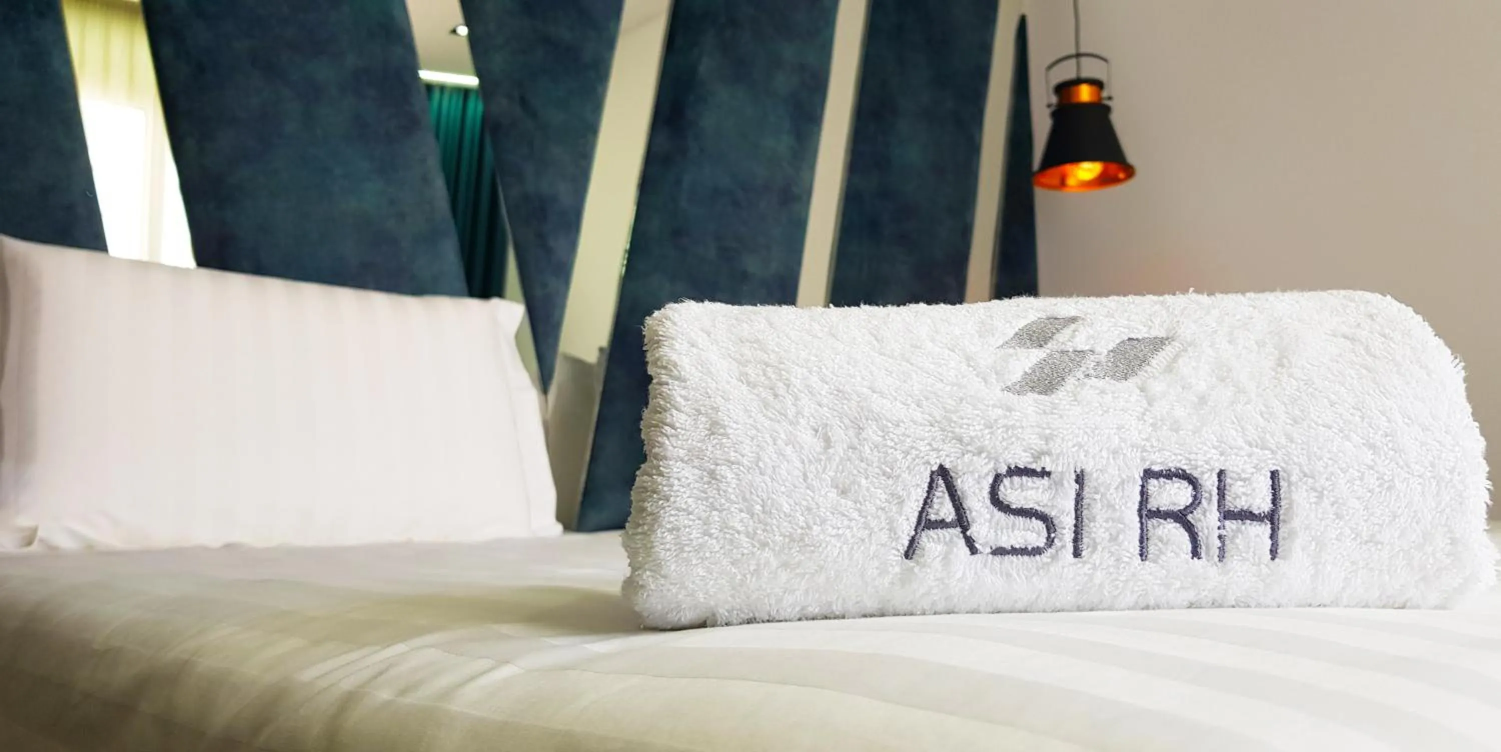 Bed in Asi Rooftop Hotel