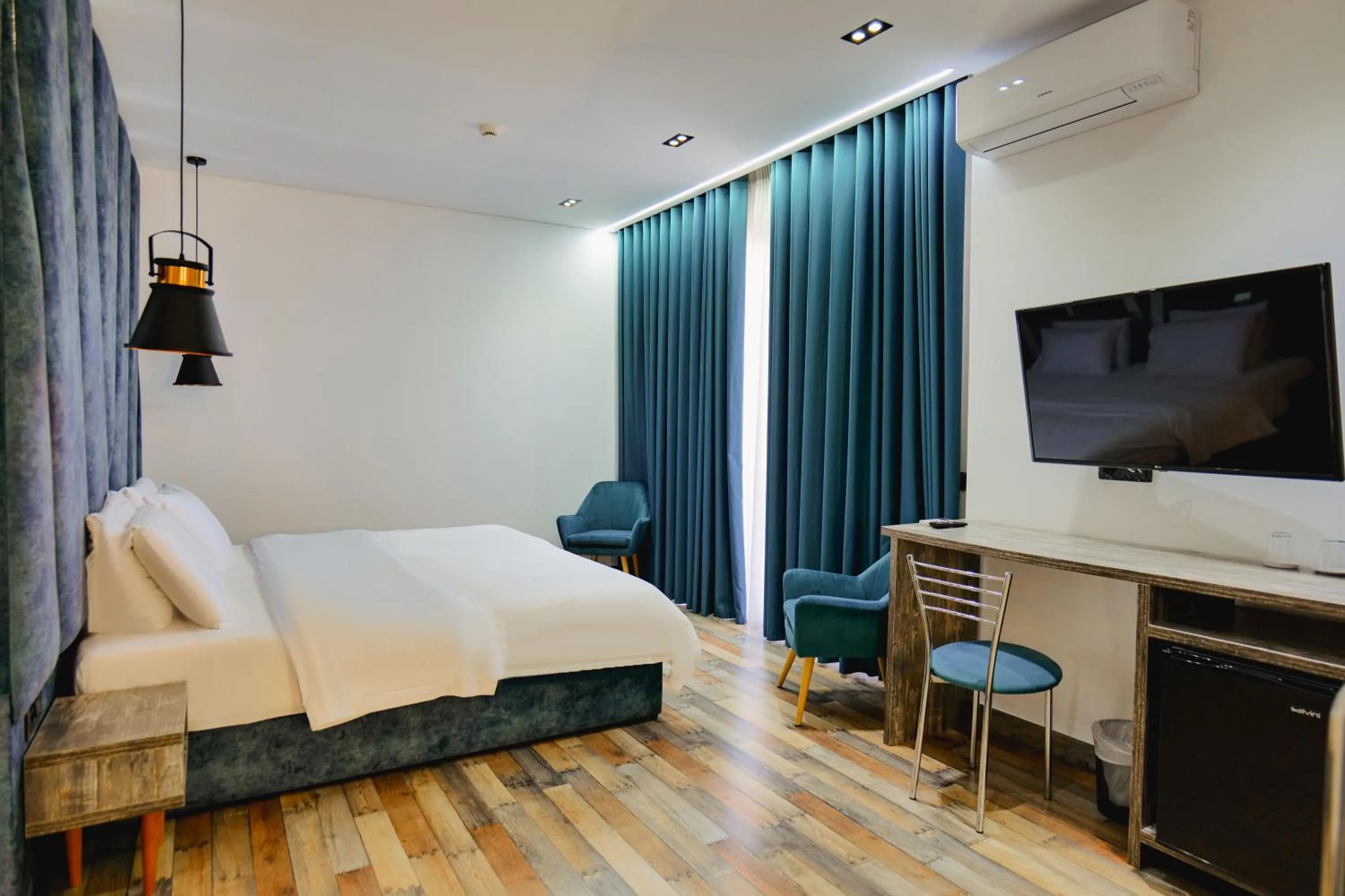 Bed in Asi Rooftop Hotel