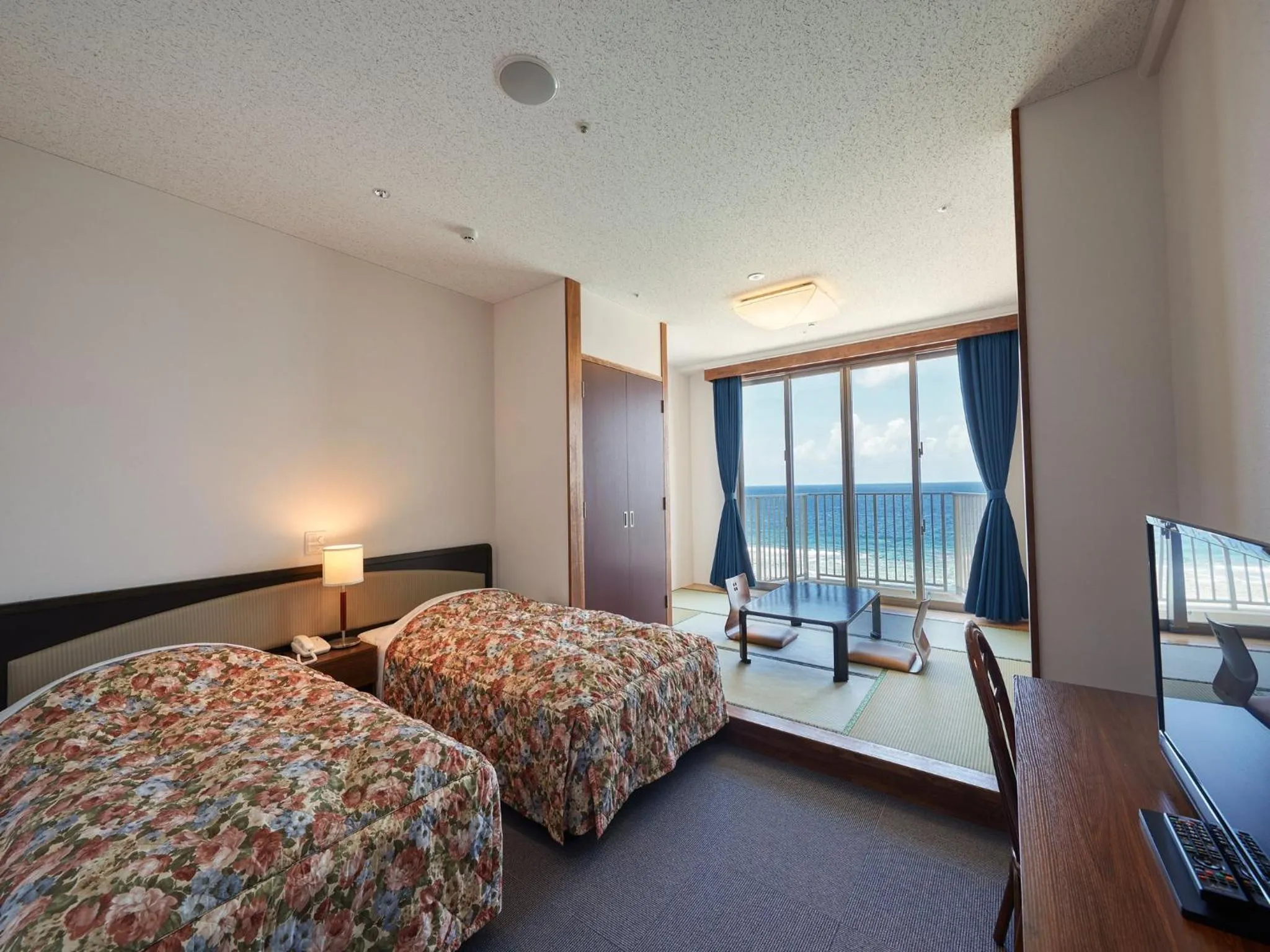 Photo of the whole room, Bed in Hotel Miyuki Beach