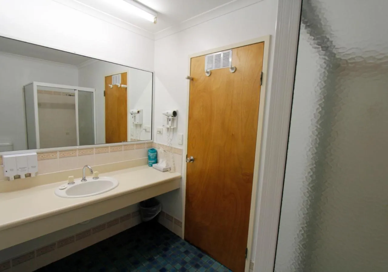 Bathroom in Blue Shades Motel