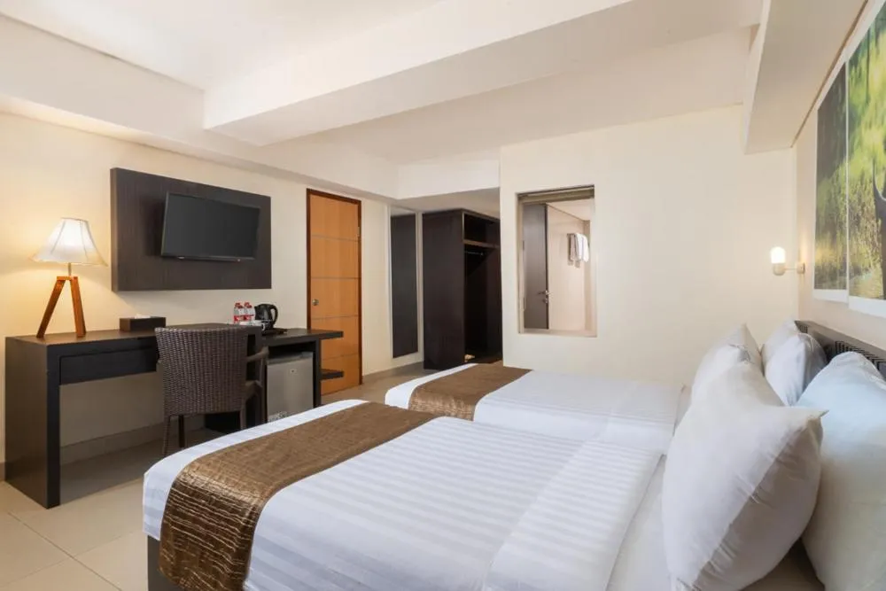 Bed in Merapi Merbabu Hotel Yogyakarta Powered by Archipelago