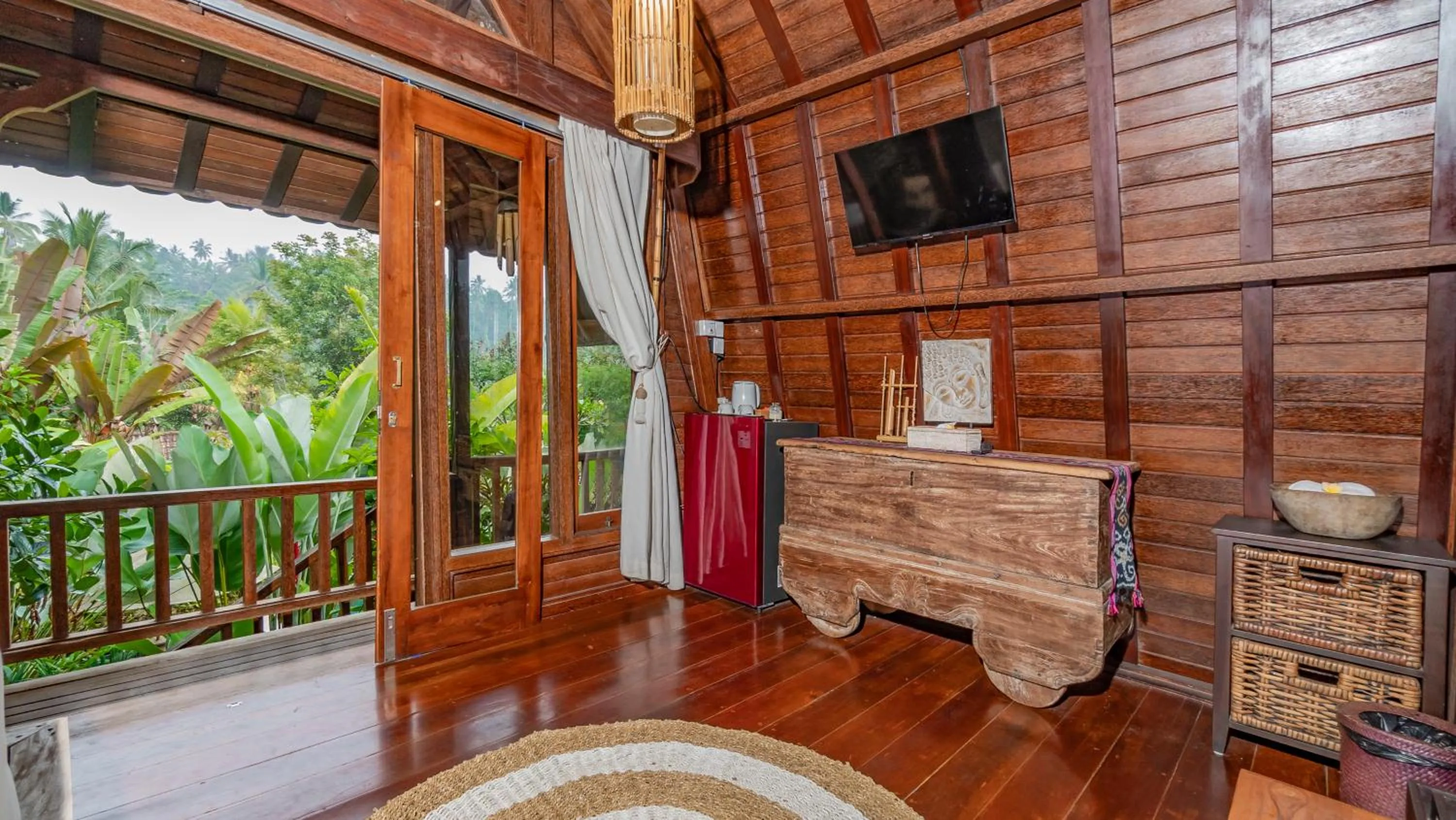 Communal lounge/ TV room in Umah Tis Sebatu