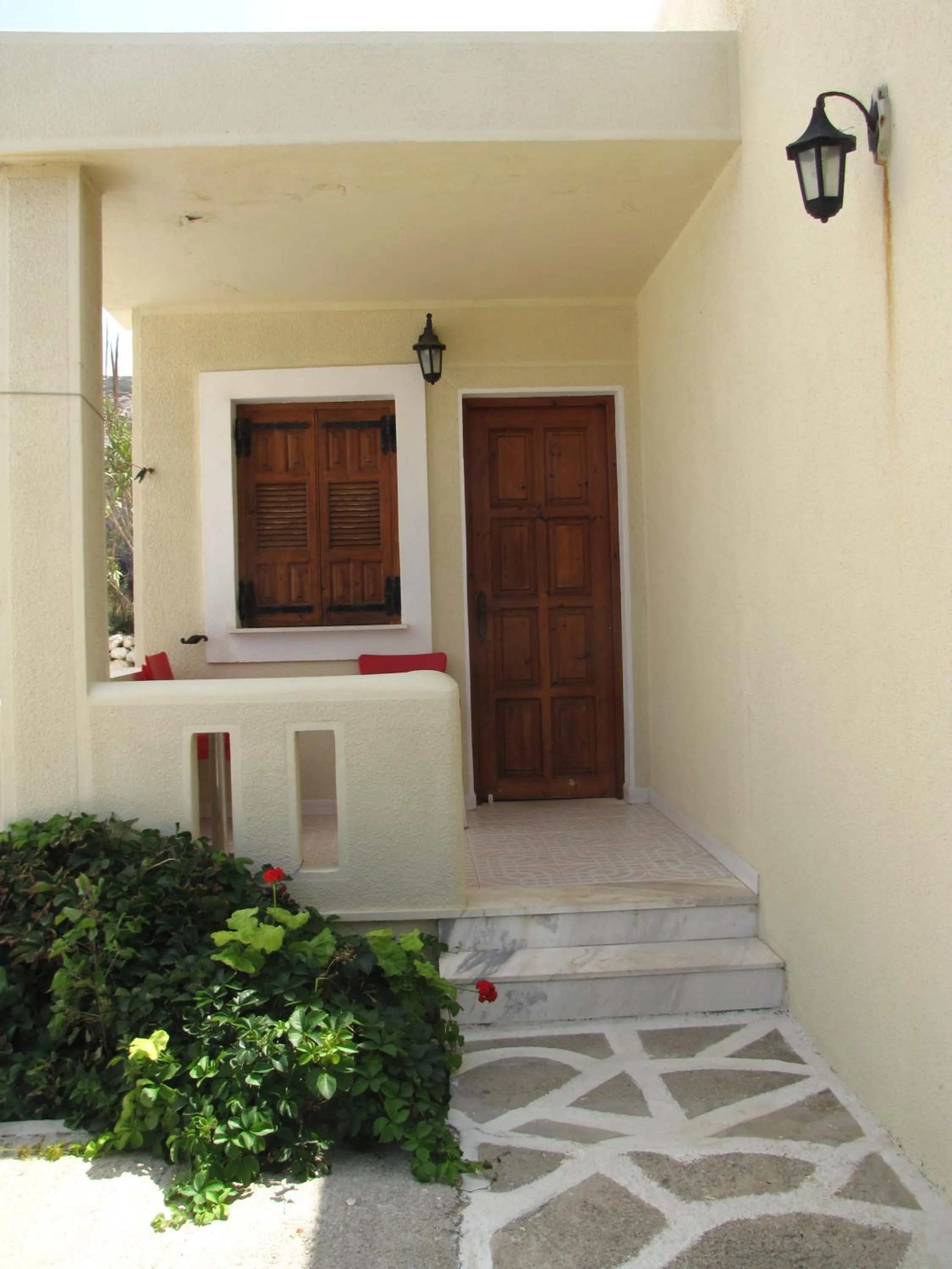 Facade/entrance in Montemar Studios & Apartments