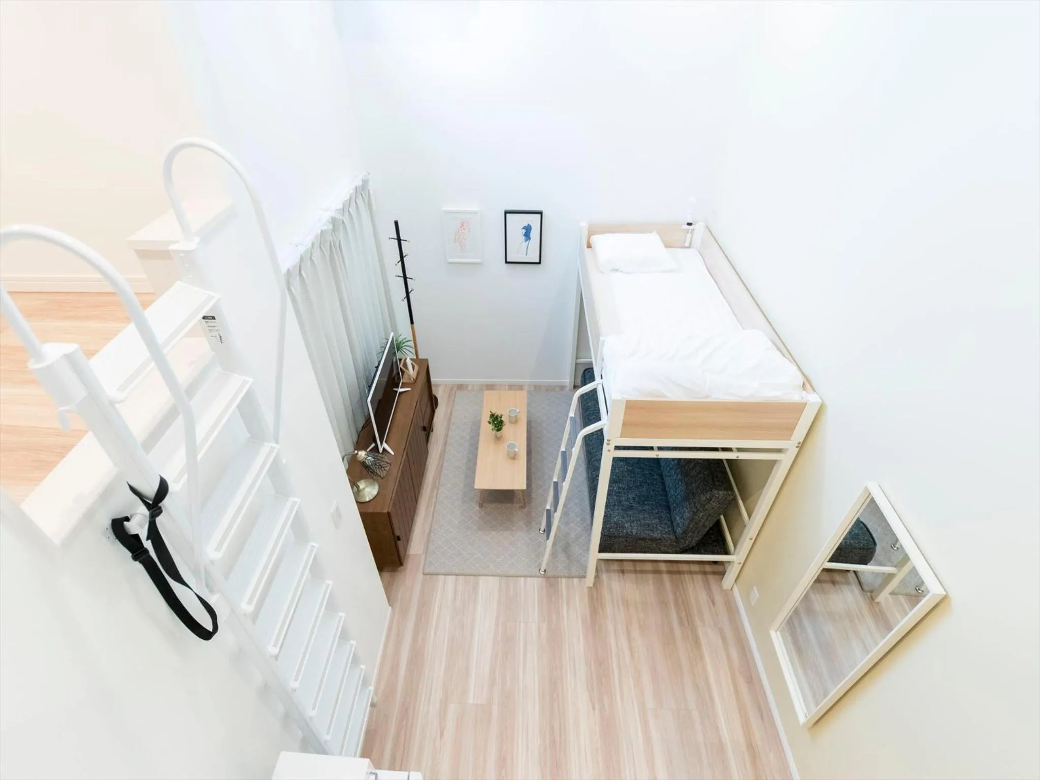 Living room, Bed in TRIP POD SUMIYOSHI C