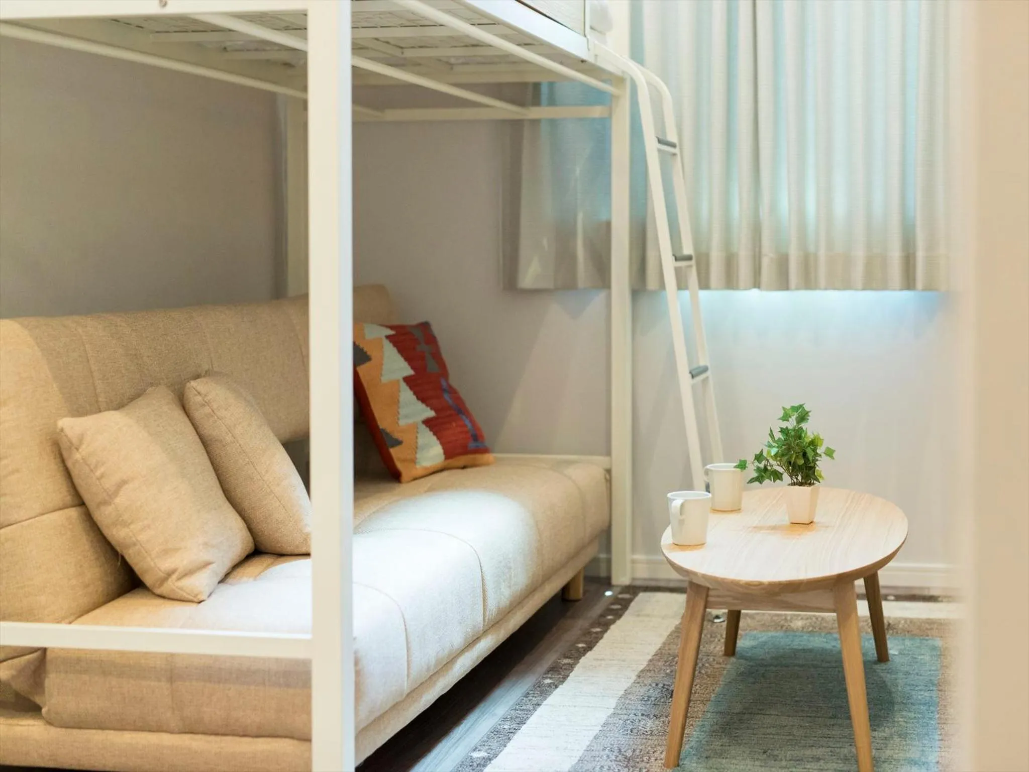 Living room, Bed in TRIP POD TOJIN-MACHI A