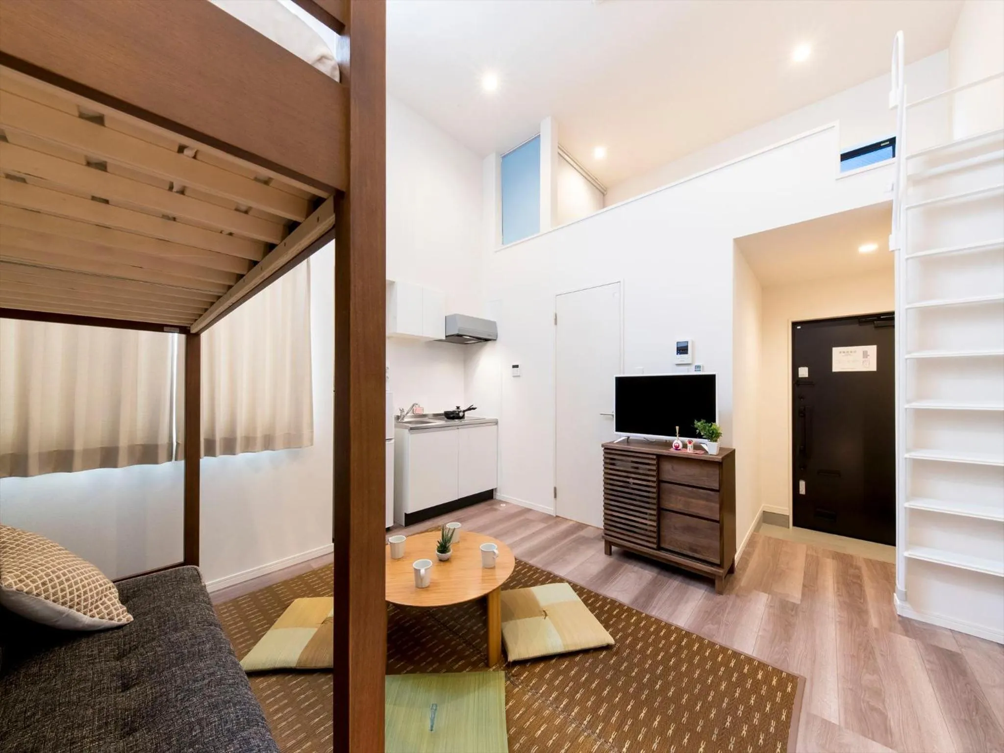 Living room, Bed in TRIP POD TOJIN-MACHI A