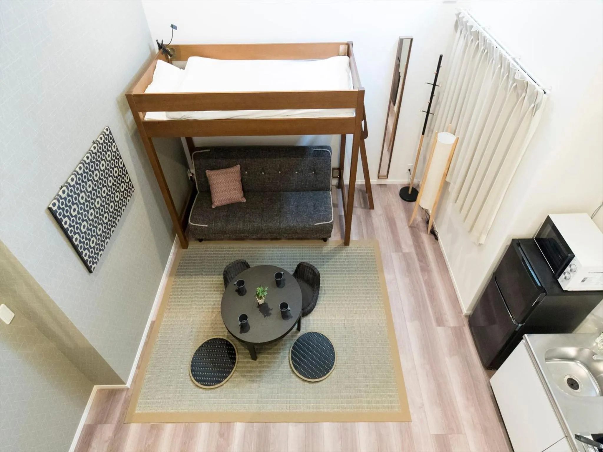 Living room in TRIP POD TOJIN-MACHI A