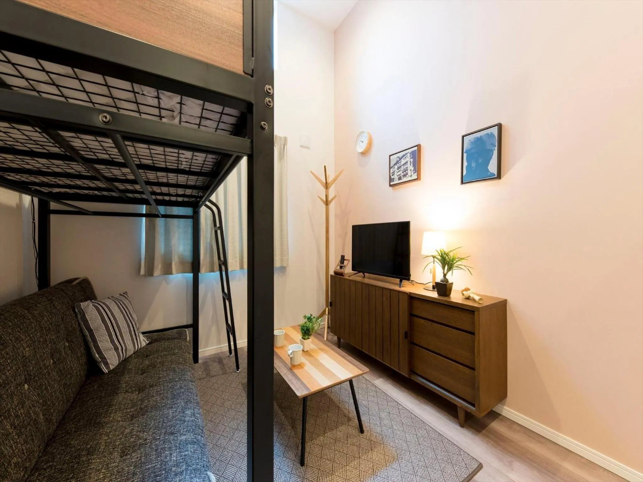 Living room, Bed in TRIP POD TOJIN-MACHI A