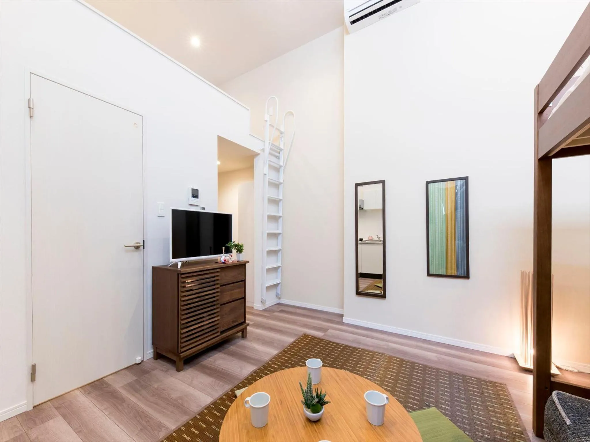 Living room in TRIP POD TOJIN-MACHI A