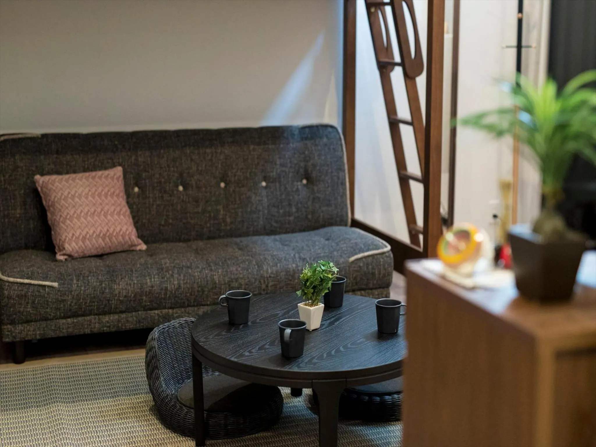 Living room in TRIP POD TOJIN-MACHI A