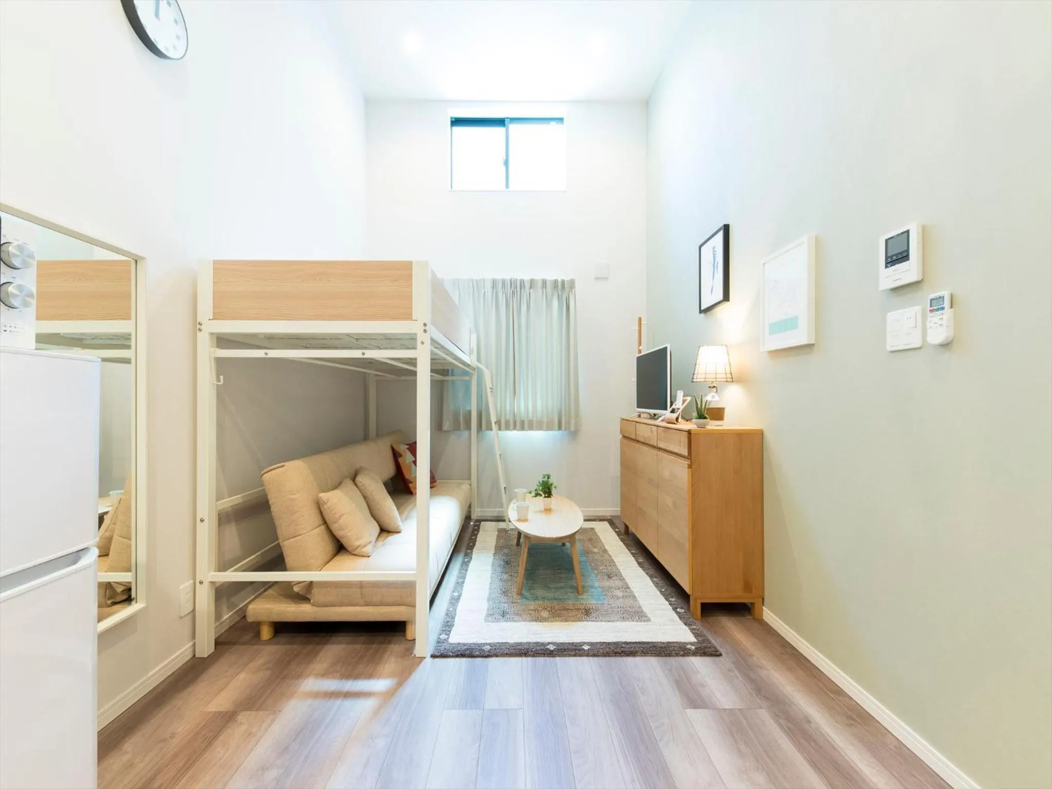 Living room, Bed in TRIP POD TOJIN-MACHI A