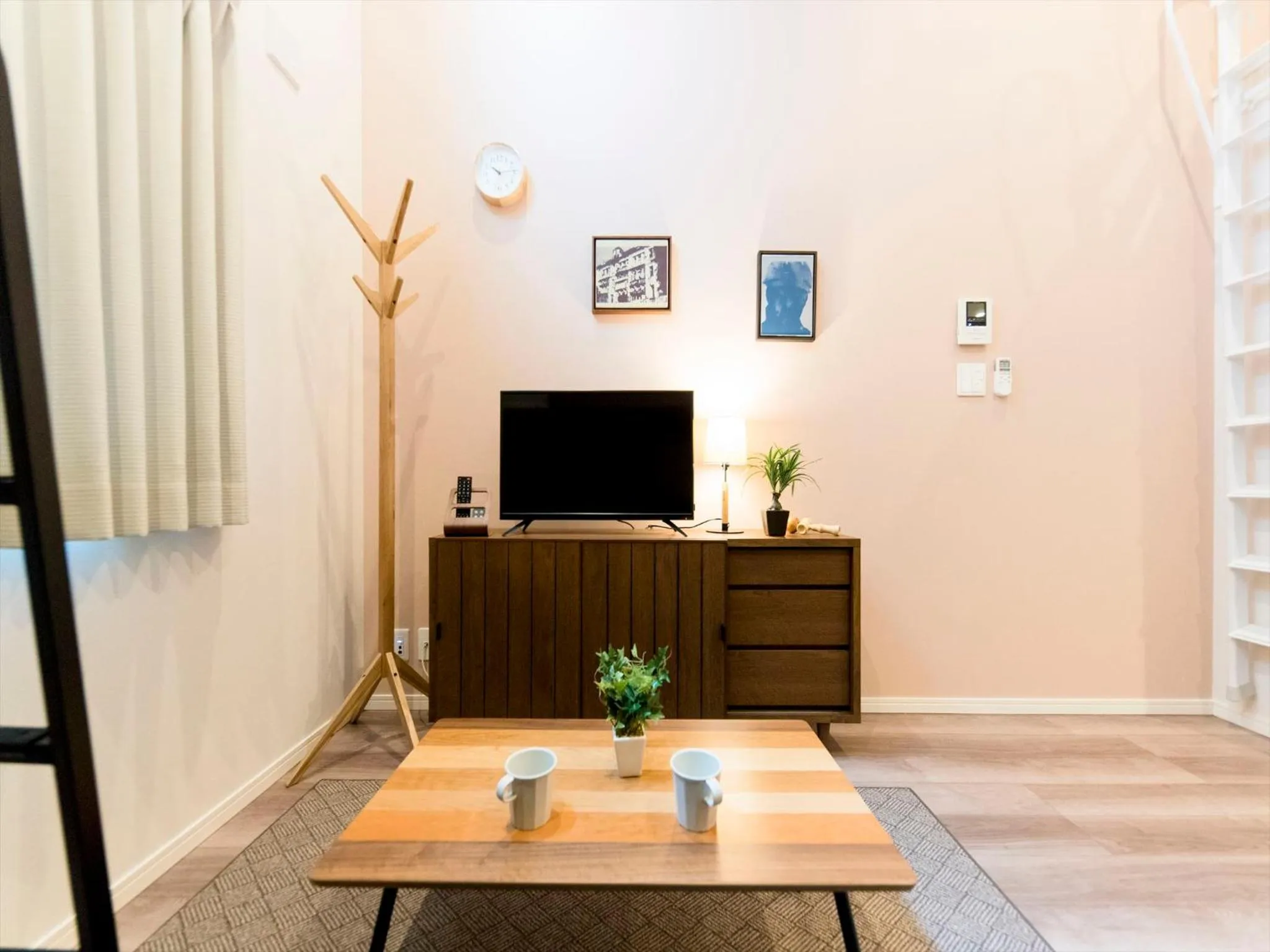 Living room in TRIP POD TOJIN-MACHI A