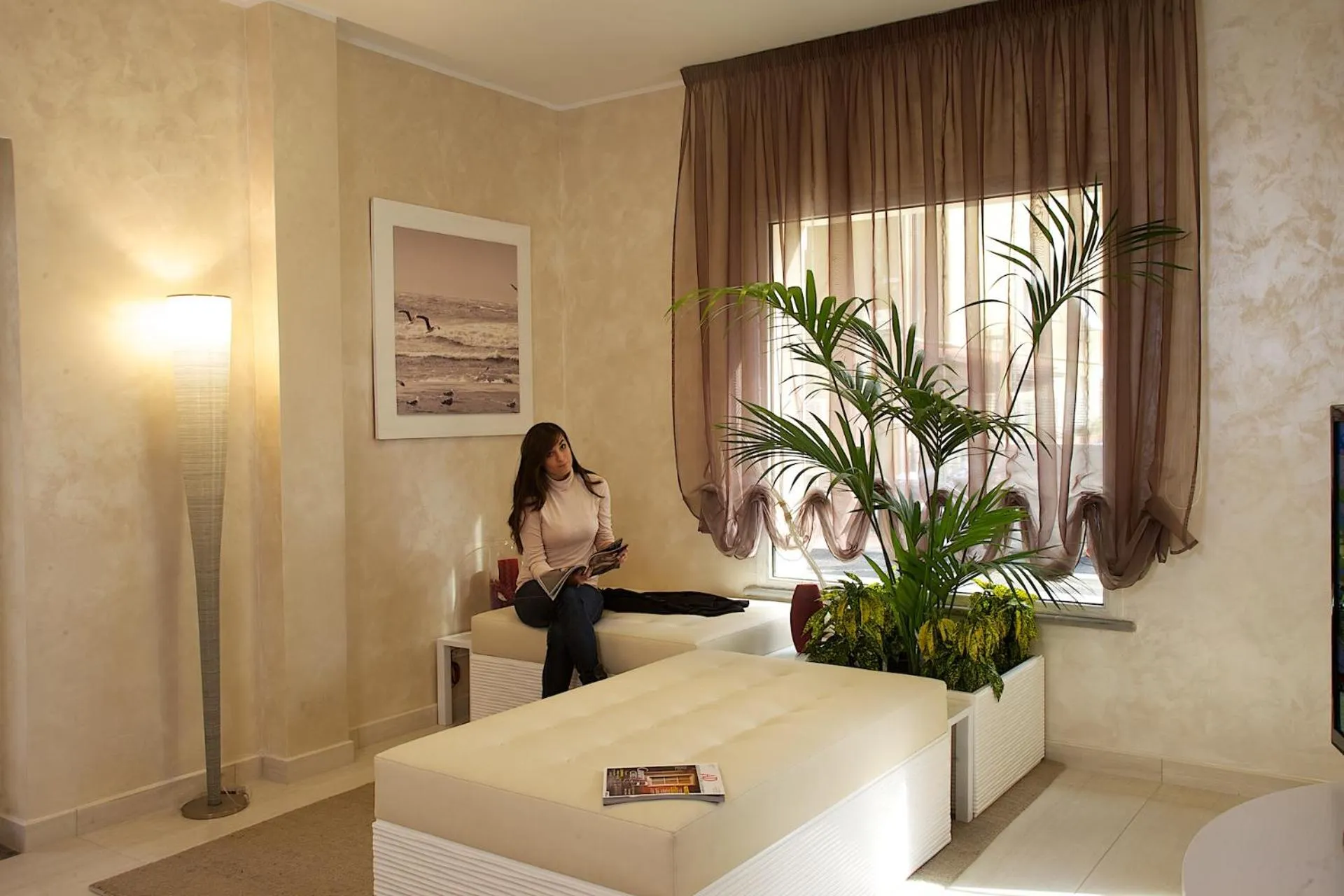 Communal lounge/ TV room in Hotel C'era Una Volta