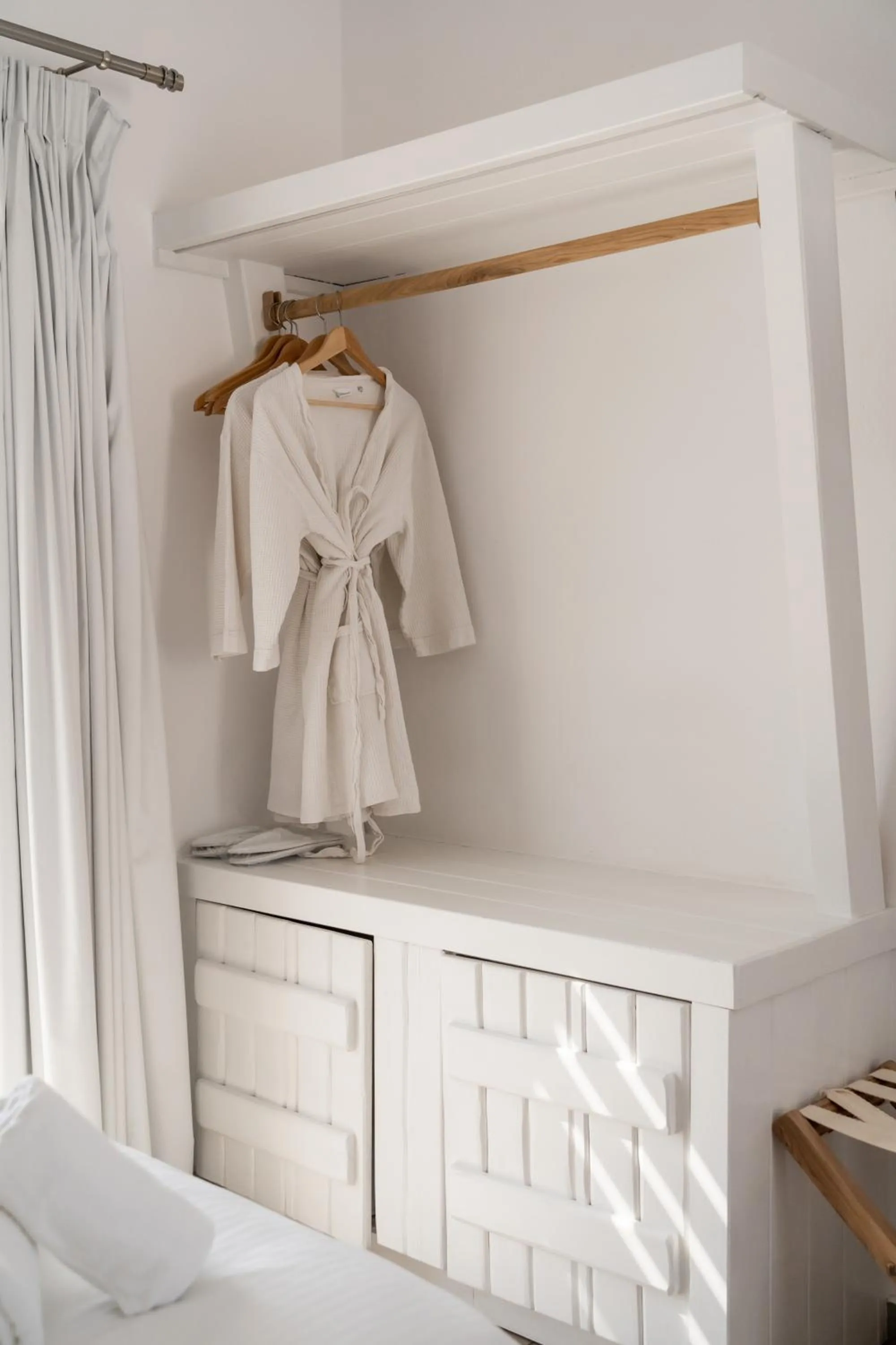 wardrobe, Bed in Super Paradise Hotel