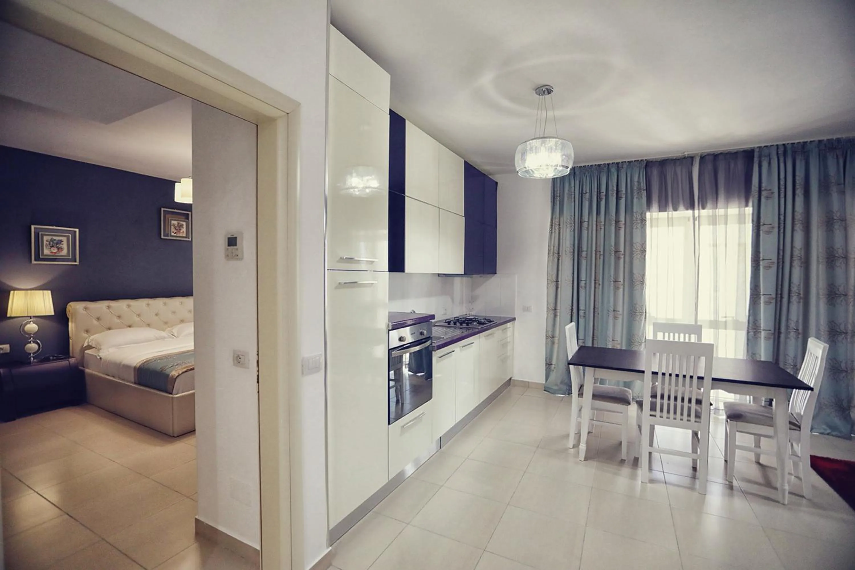 kitchen, Bed in Velipoja Grand Europa Resort, Affiliated by Melia