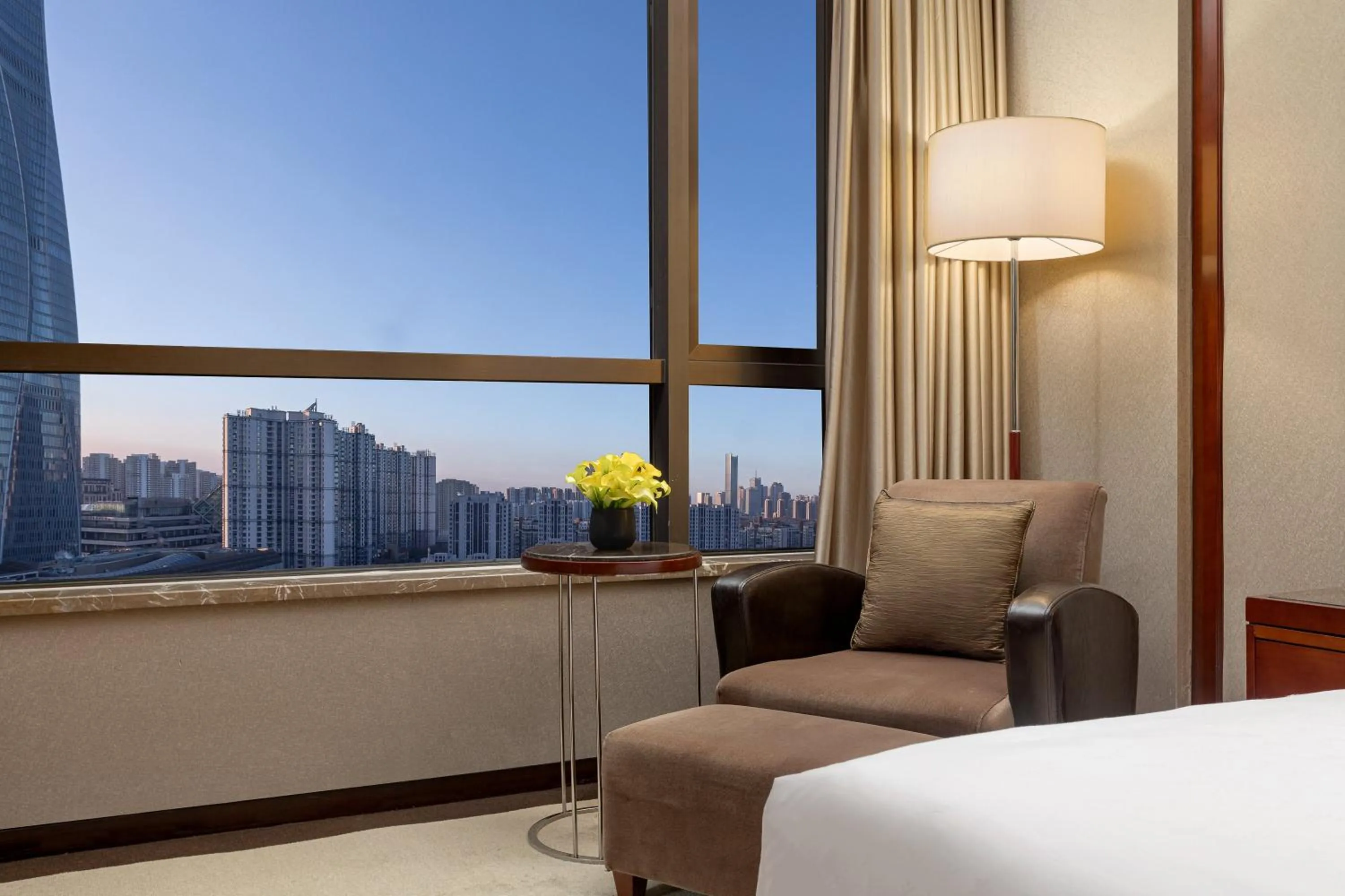 Photo of the whole room, Bed in Crowne Plaza Tianjin Binhai Center by IHG