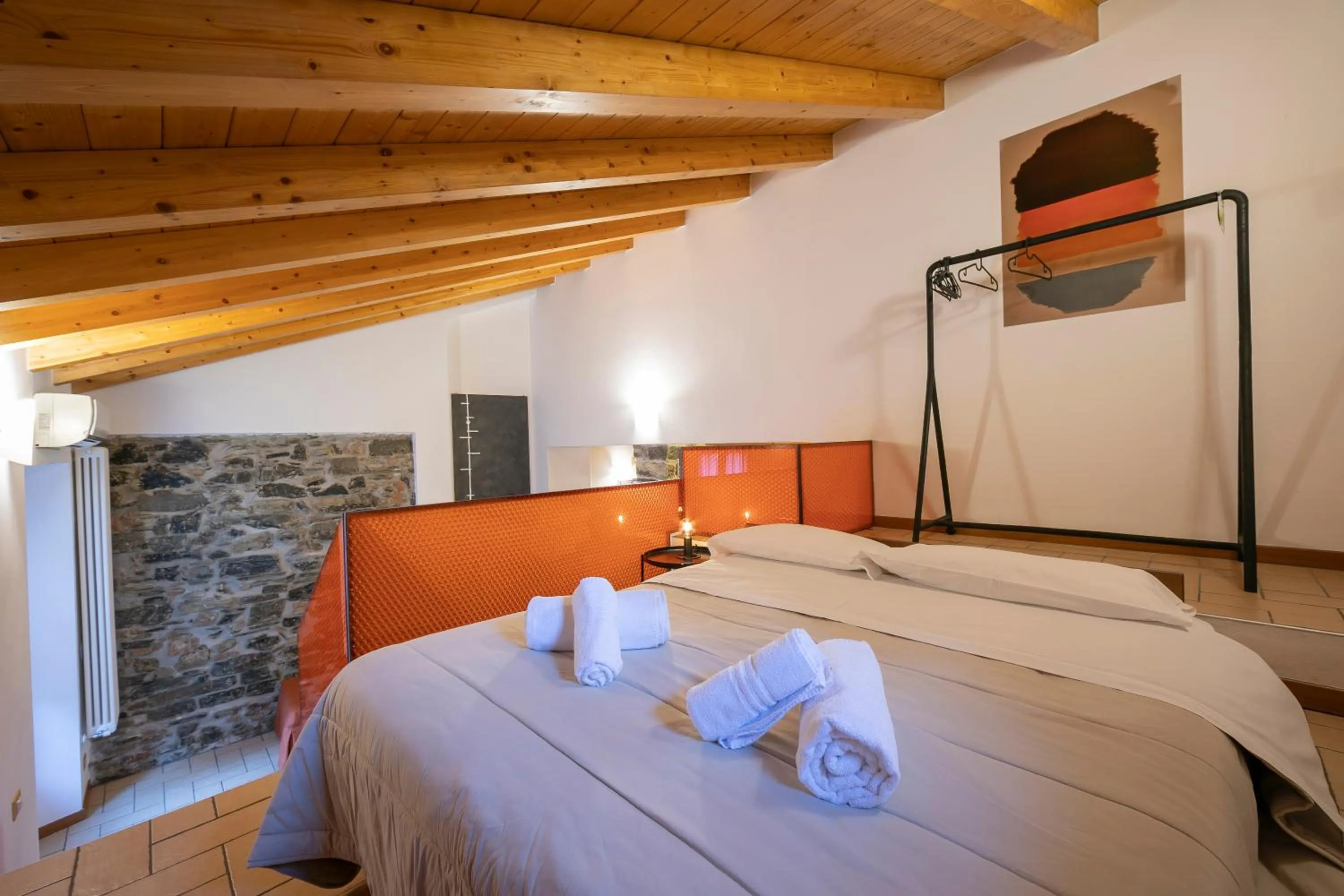 Bedroom, Bed in Le Stanze del Lago Apartments