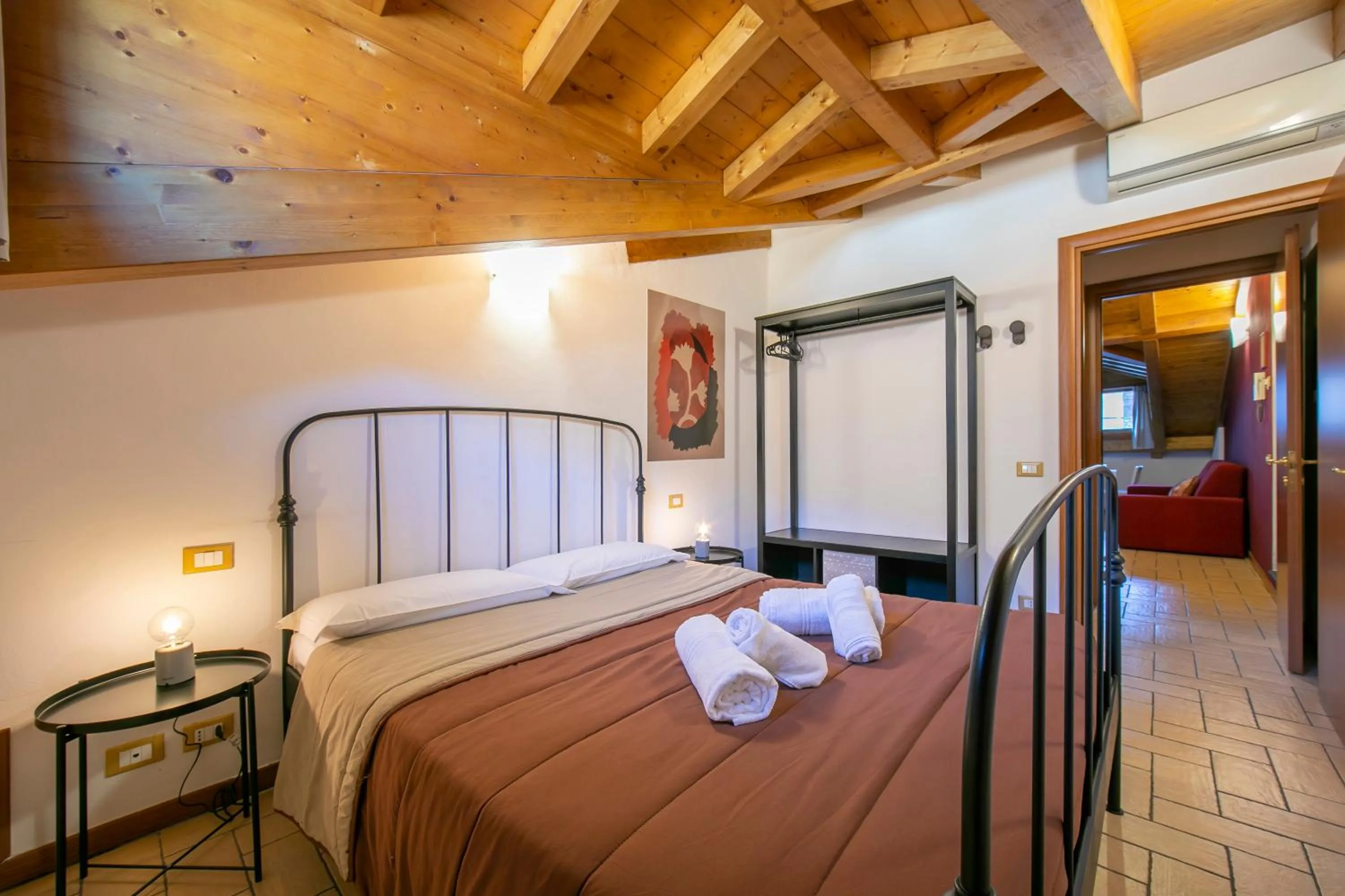 Bedroom, Bed in Le Stanze del Lago Apartments