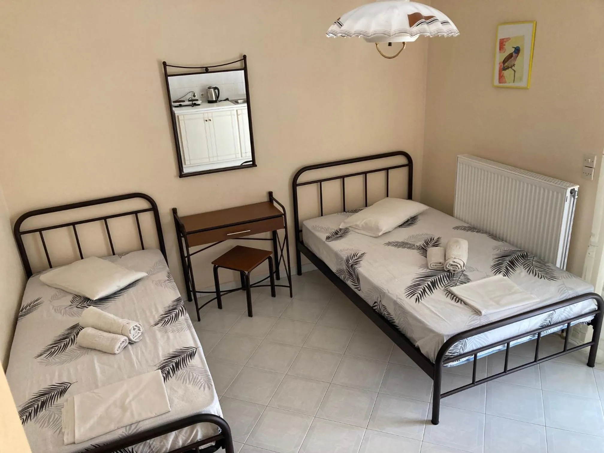 Bed in Polyxenis Rooms