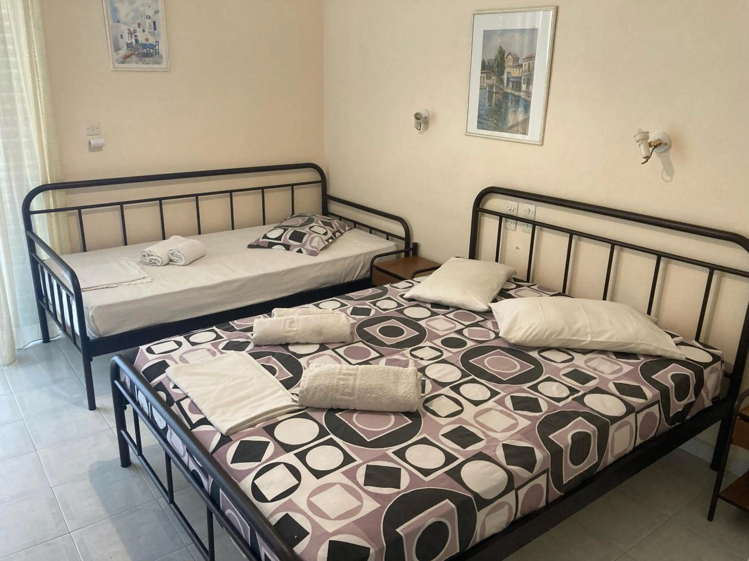 Bed in Polyxenis Rooms