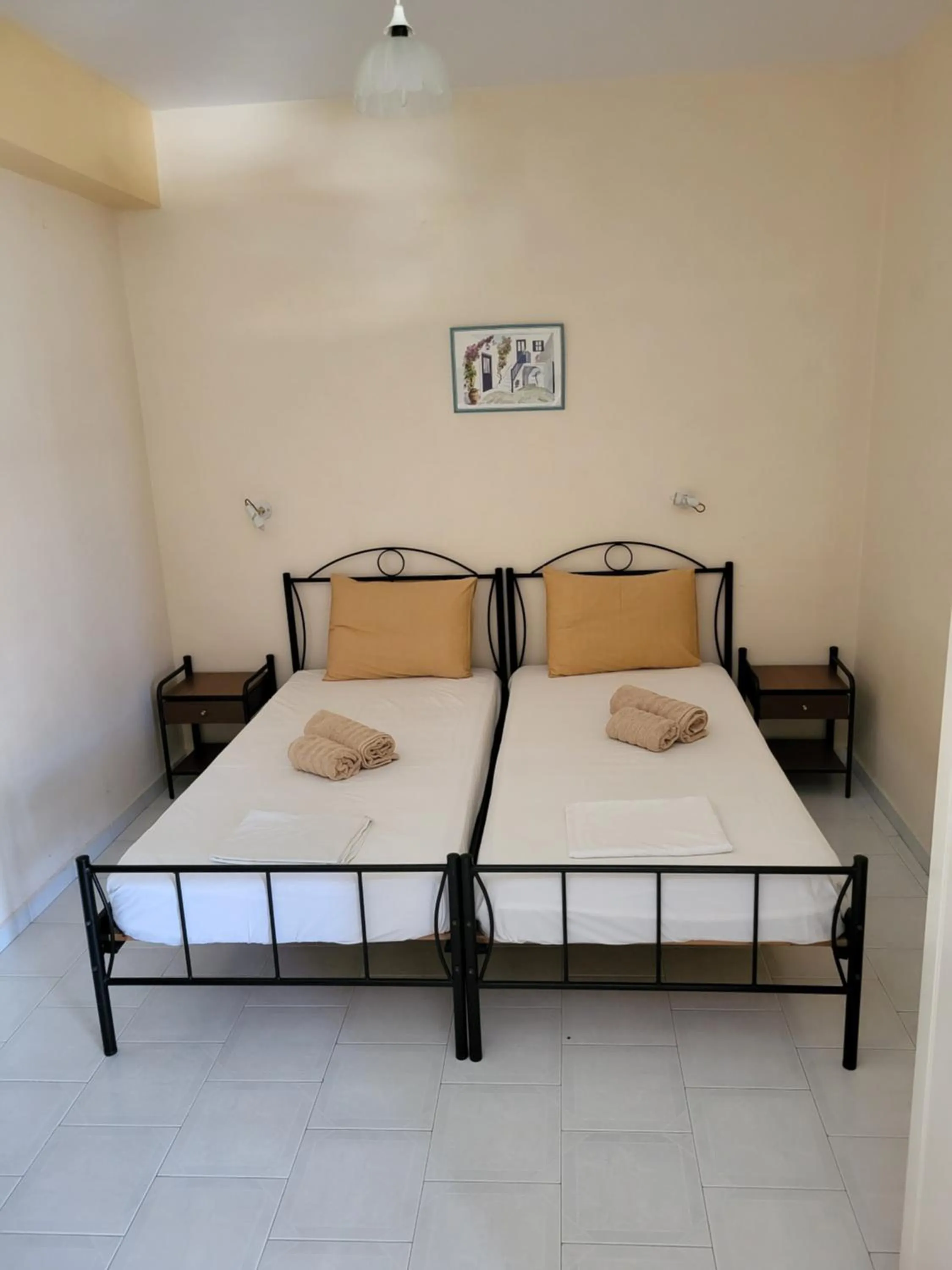 Bed in Polyxenis Rooms