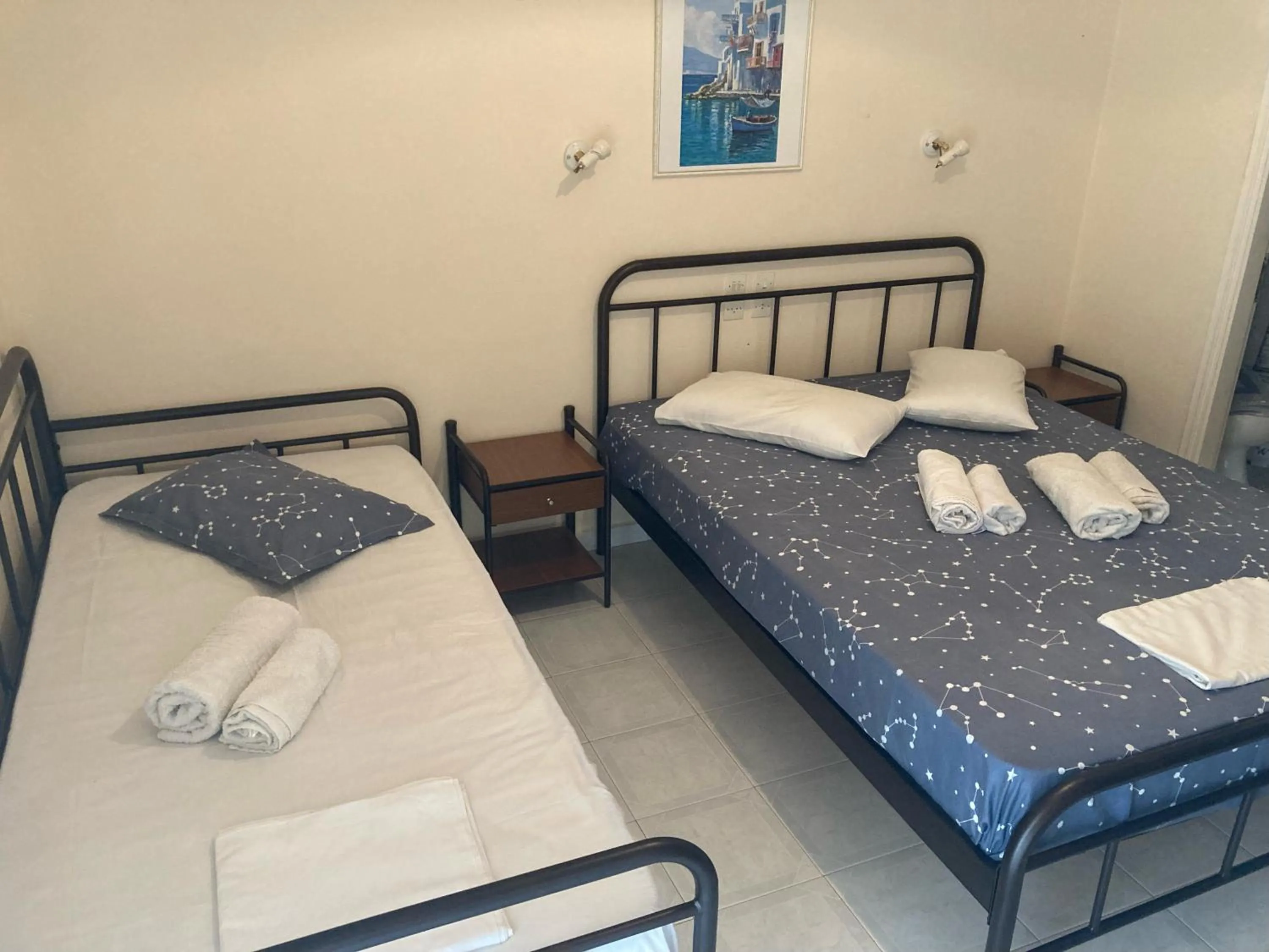 Bed in Polyxenis Rooms