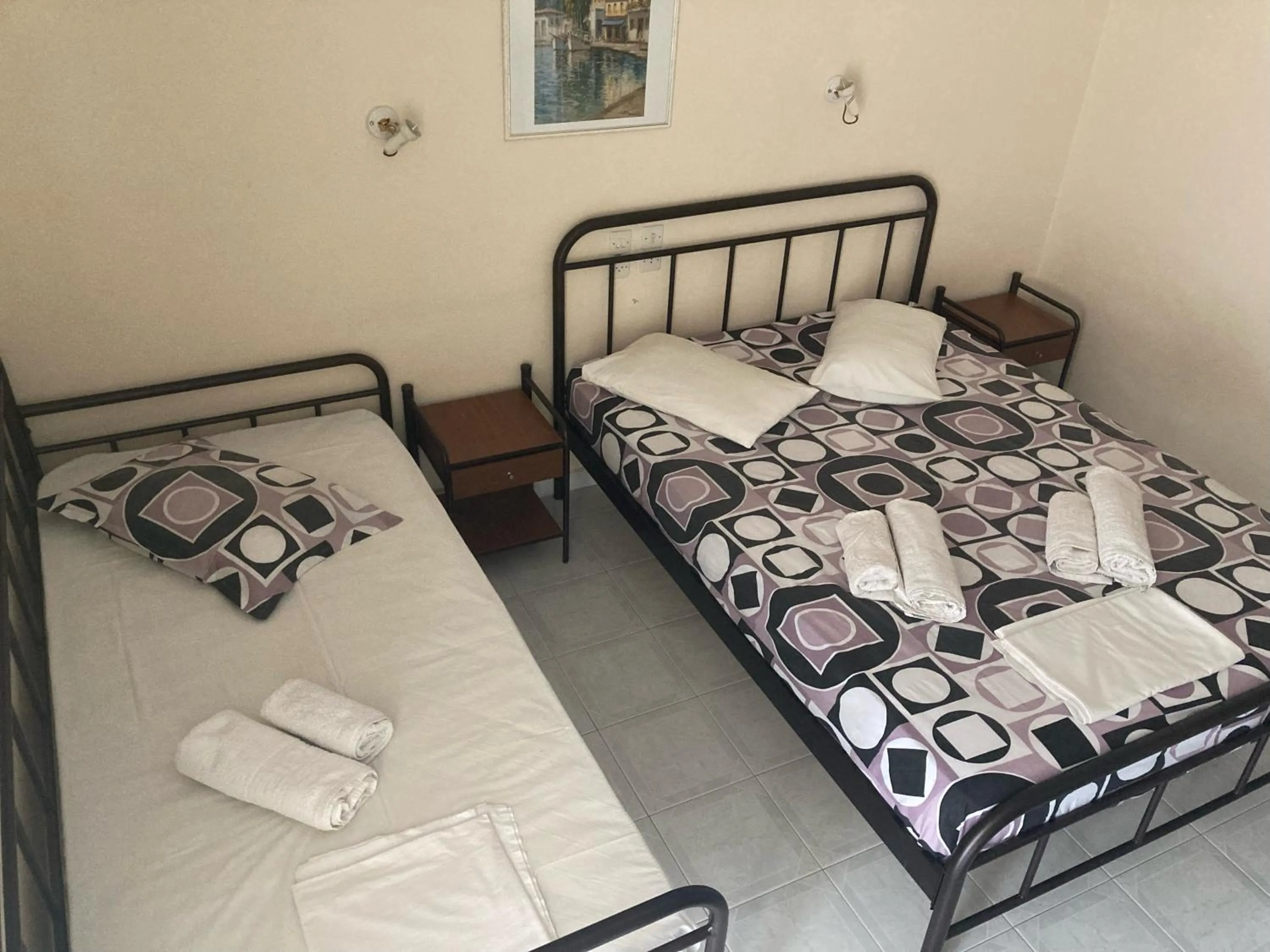 Bed in Polyxenis Rooms