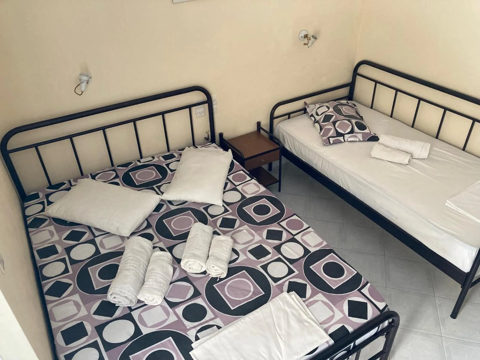 Bed in Polyxenis Rooms