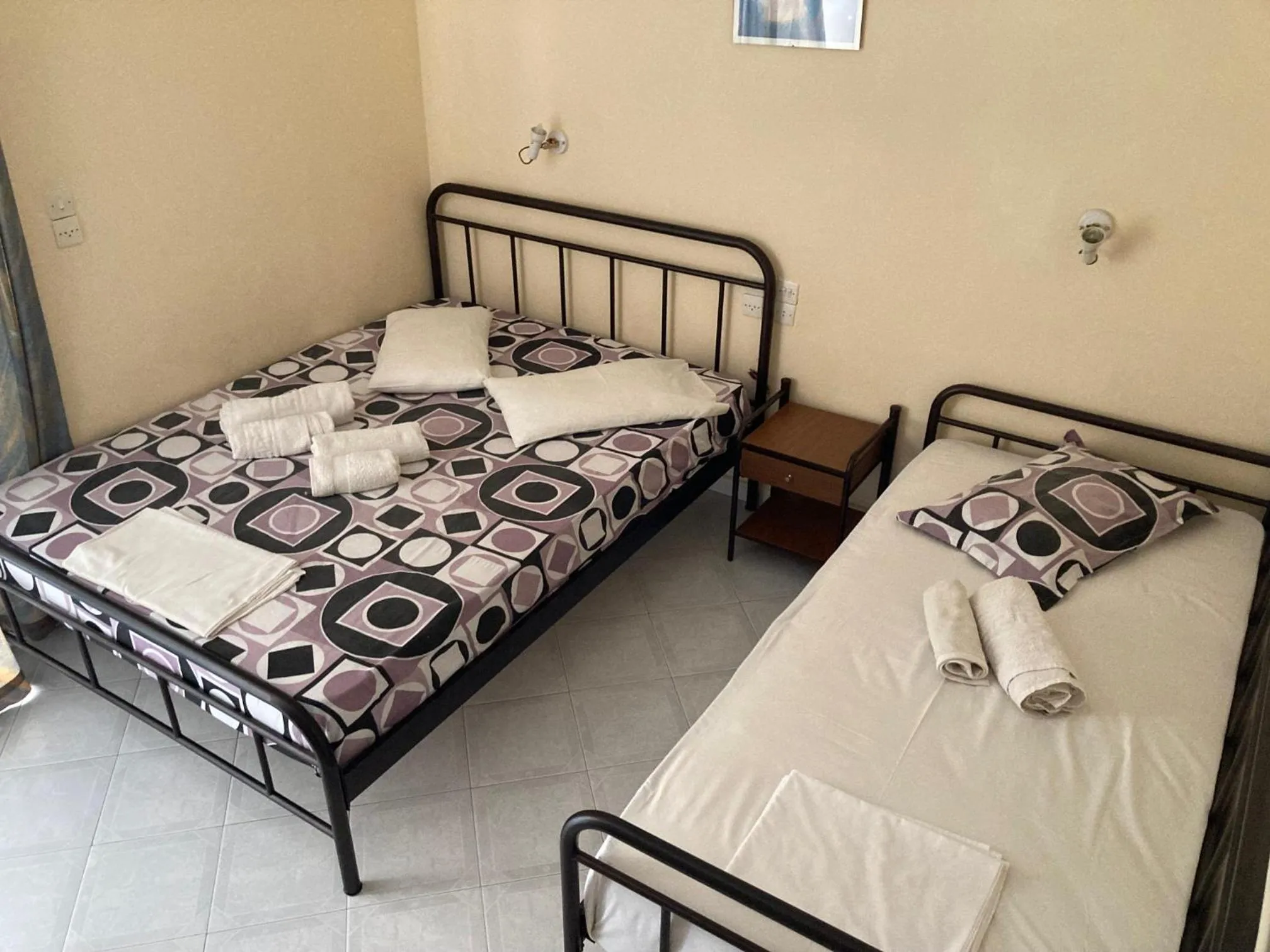 Bed in Polyxenis Rooms