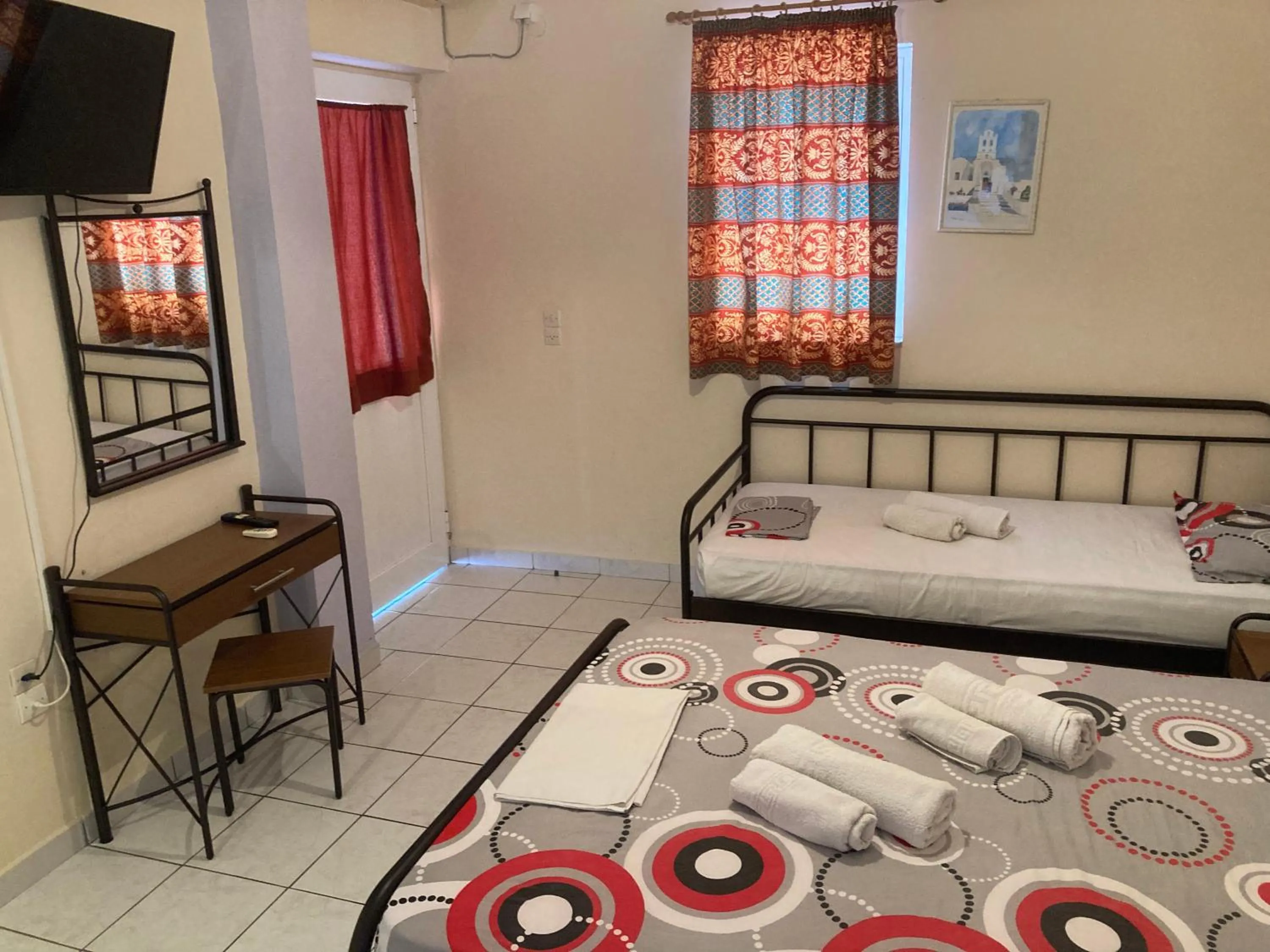 Bed in Polyxenis Rooms