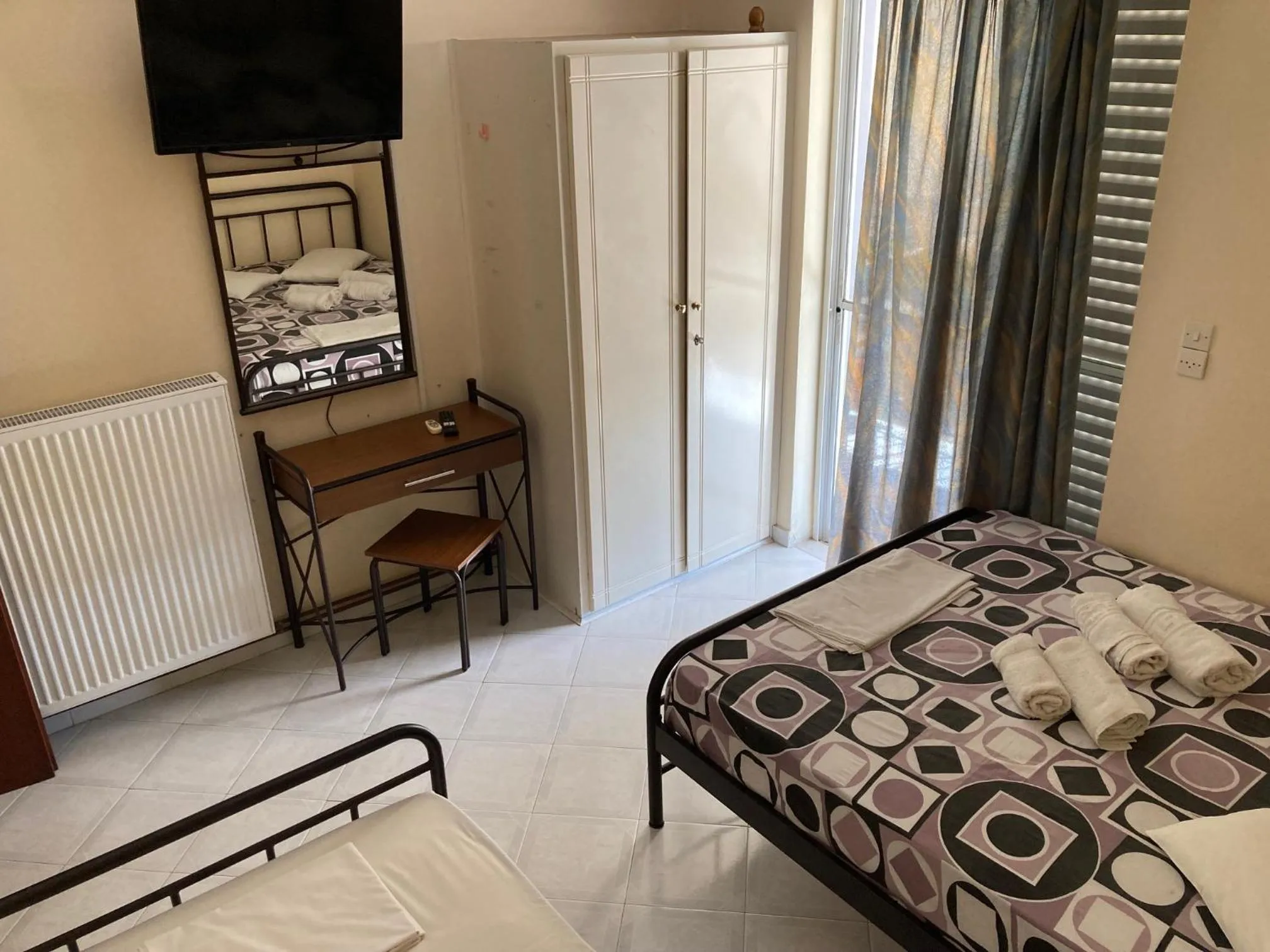 Bed in Polyxenis Rooms