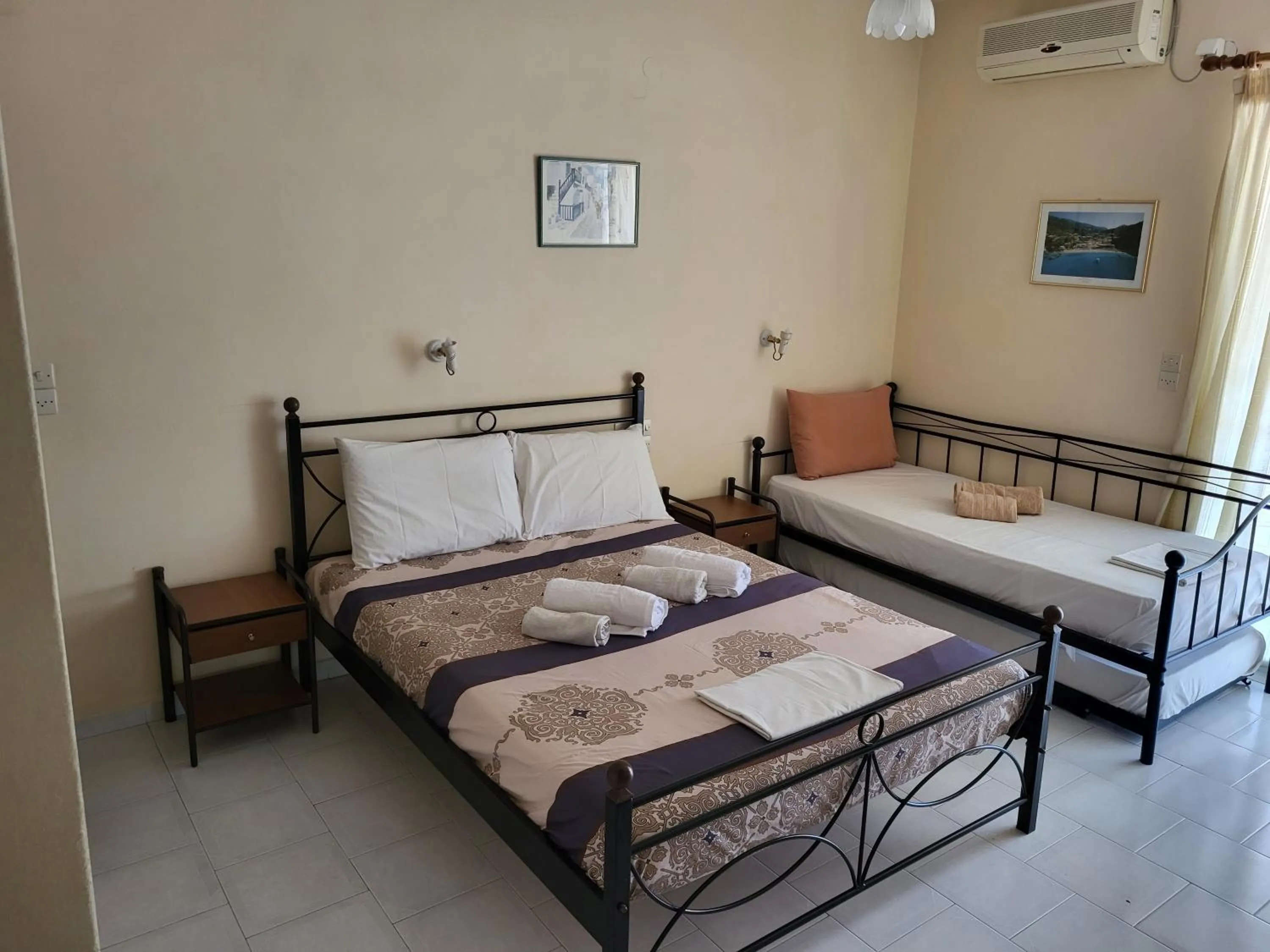 Bed in Polyxenis Rooms