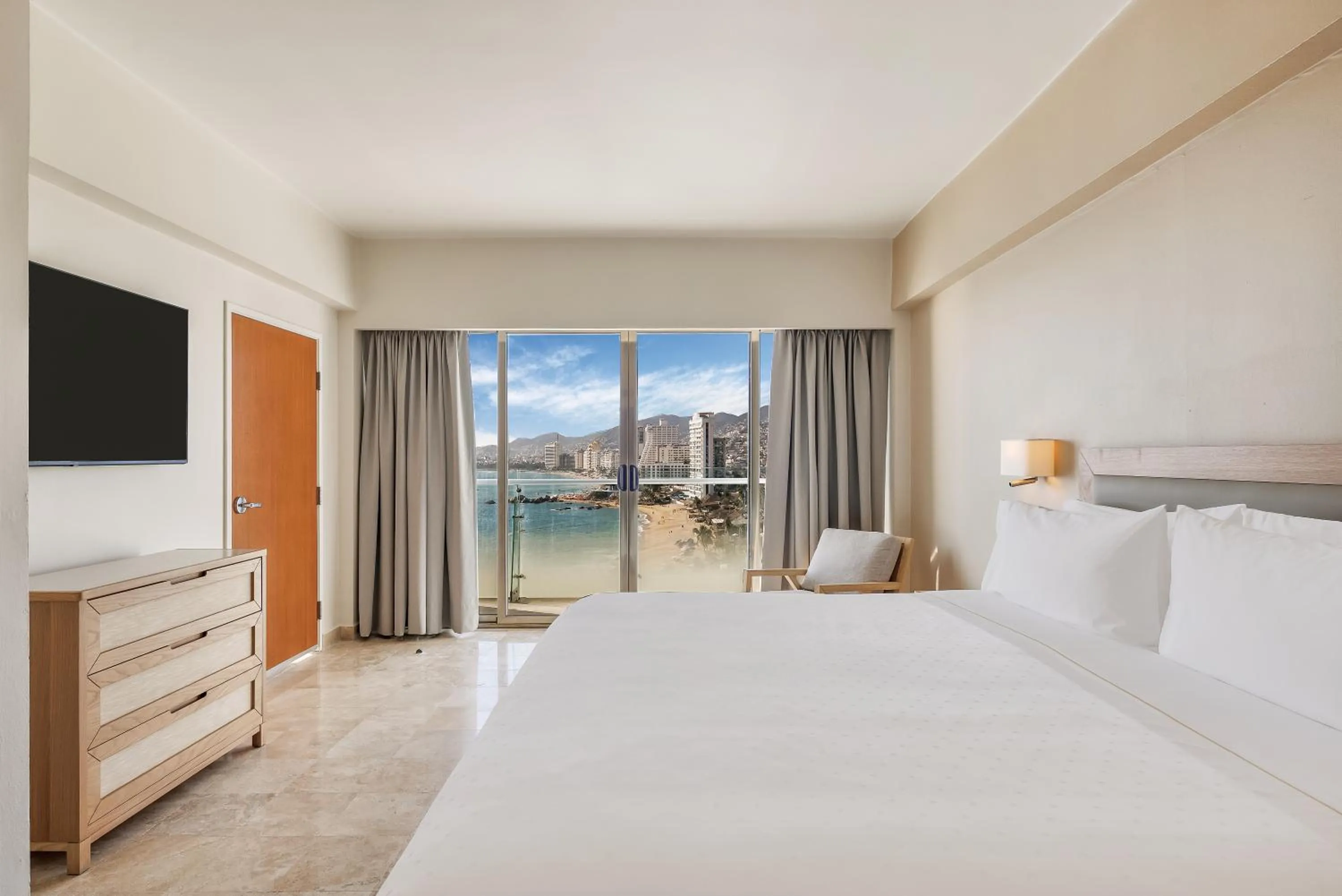 Bed in Fiesta Americana Acapulco Villas