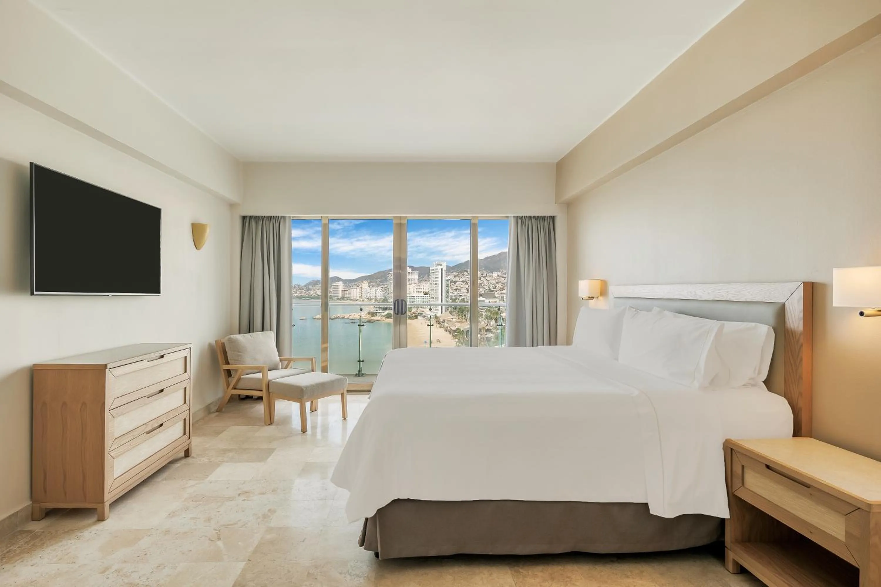 Bed in Fiesta Americana Acapulco Villas