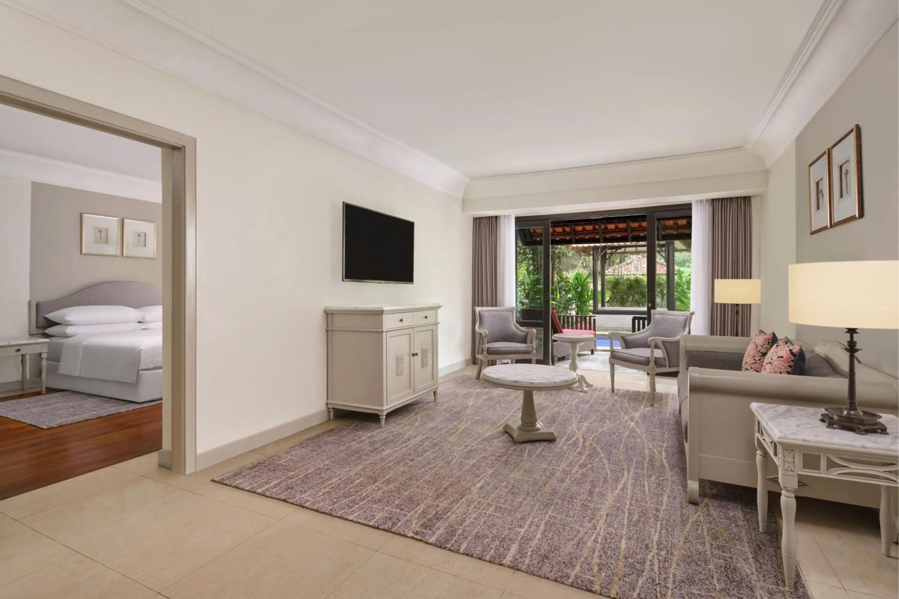 Living room, Bed in Mustika Yogyakarta Resort and Spa