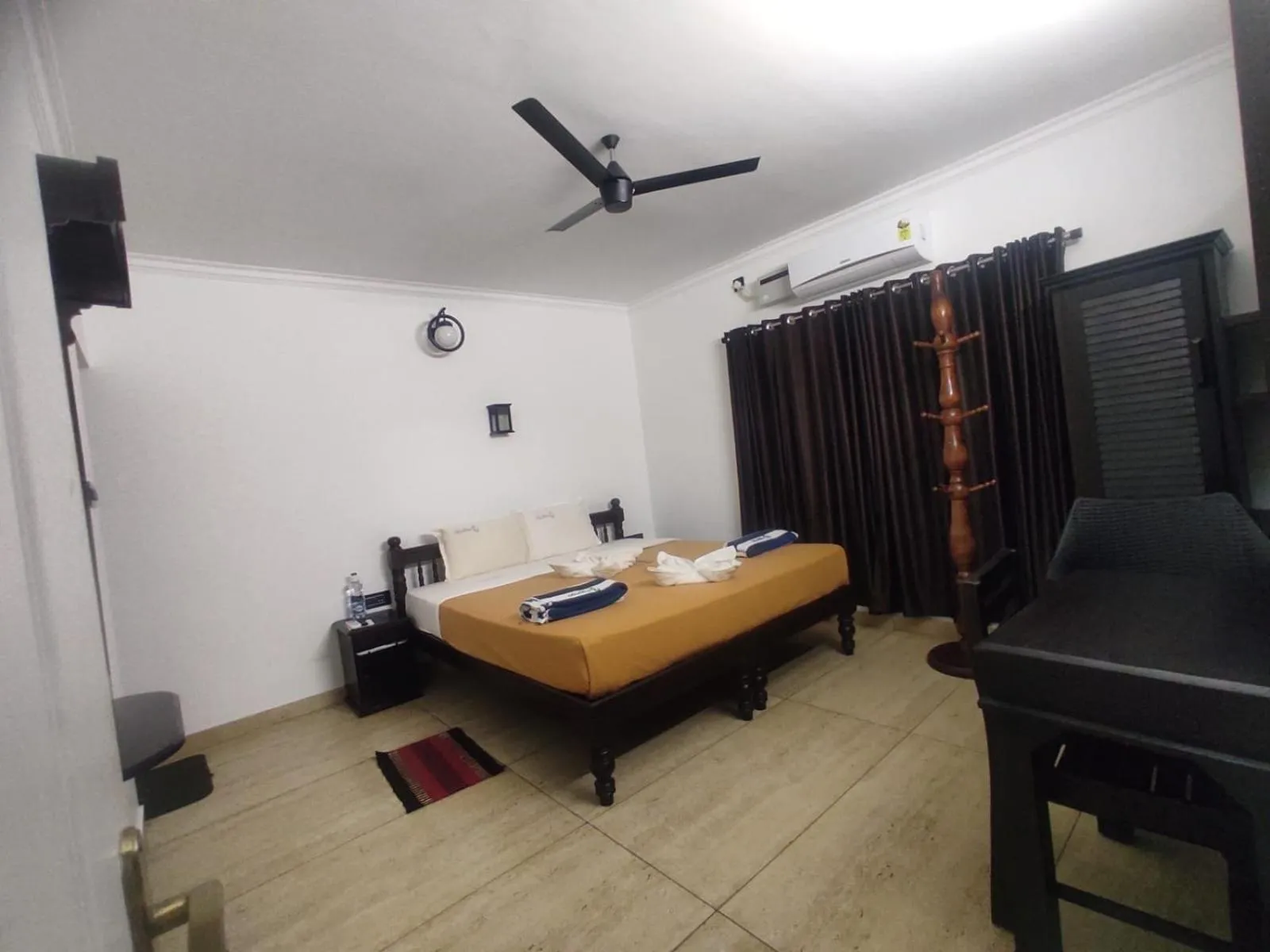 Bed in Blue Water Beach Resort