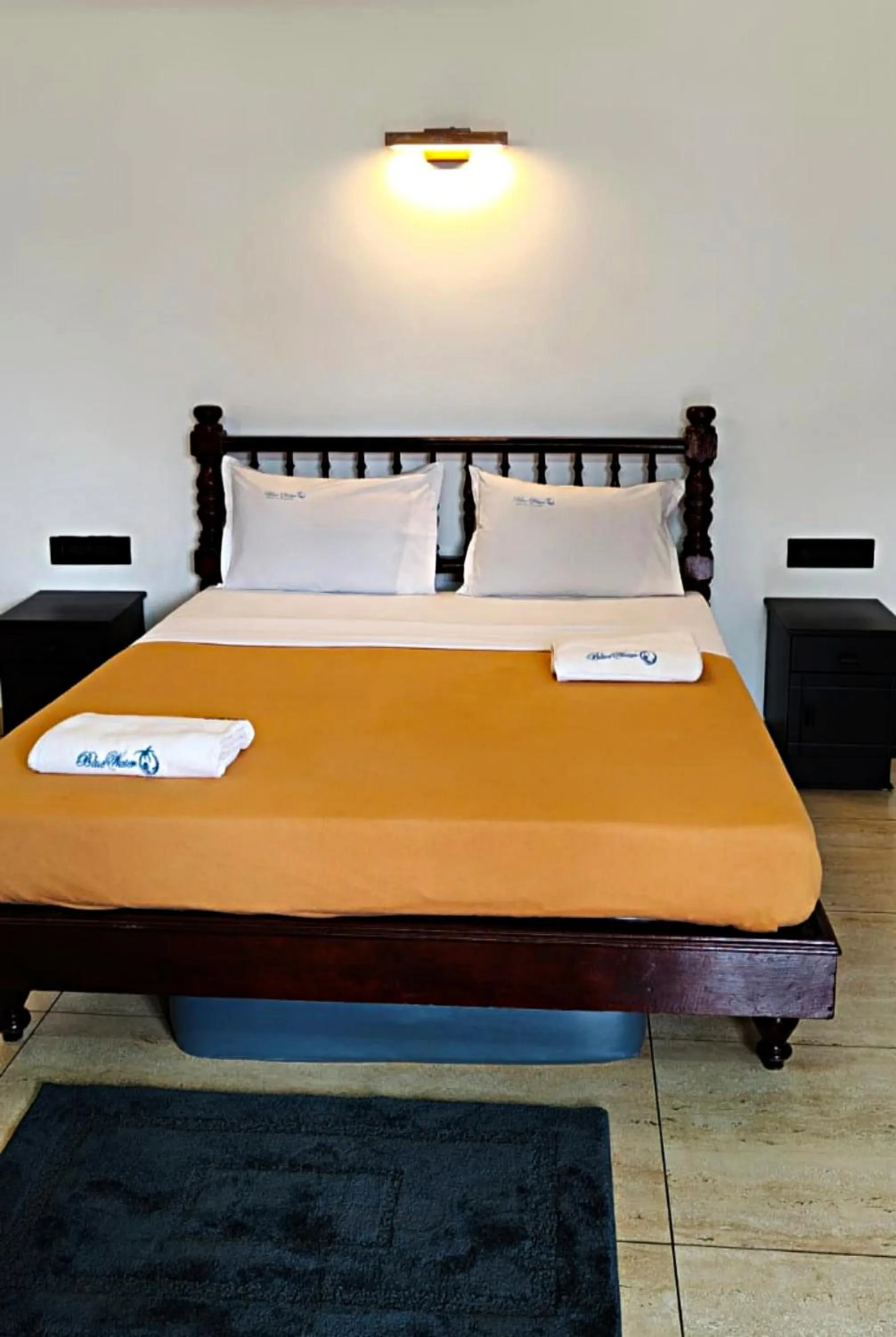 Bed in Blue Water Beach Resort