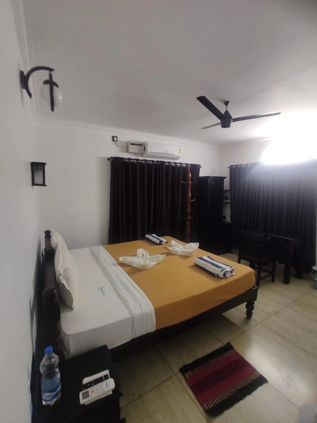 Bed in Blue Water Beach Resort