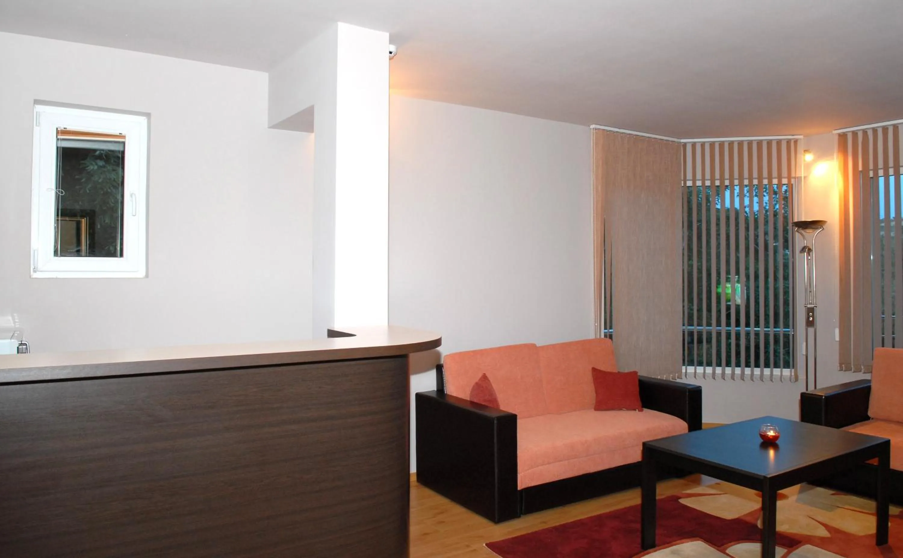 Communal lounge/ TV room in Hotel Avis