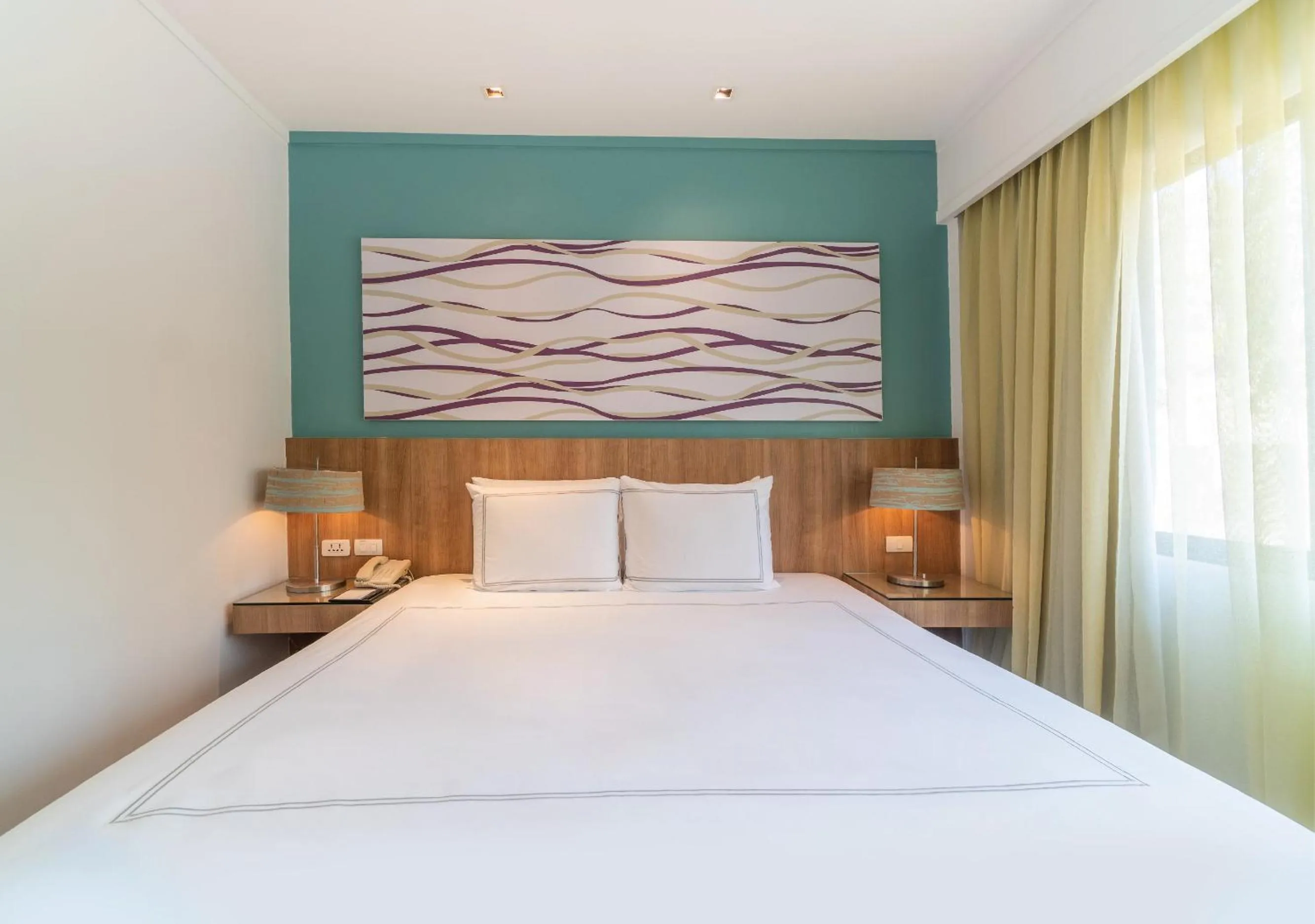 Bedroom, Bed in Radisson Resort and Suites Phuket