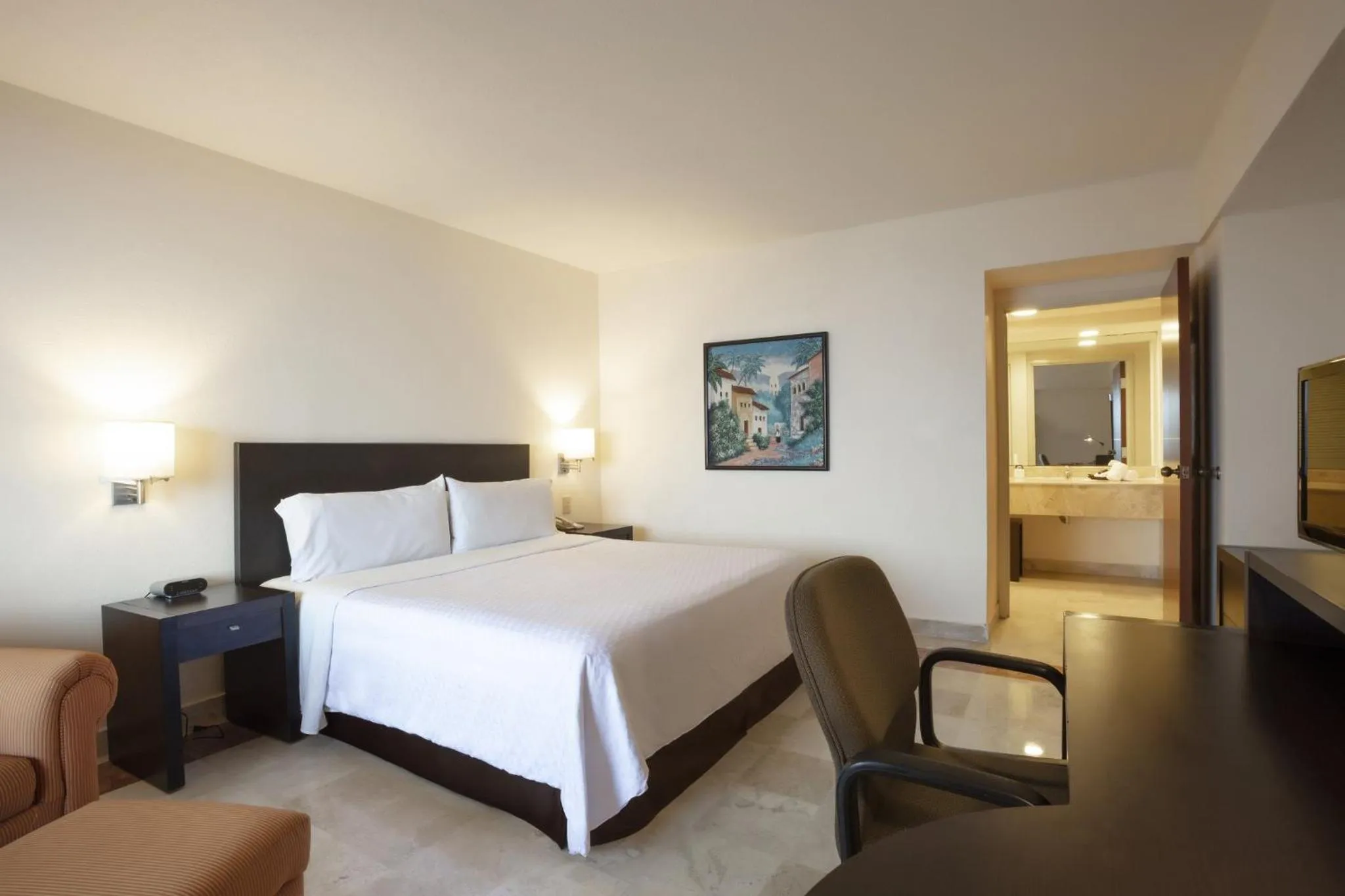 Photo of the whole room, Bed in Fiesta Inn Veracruz Boca Del Rio