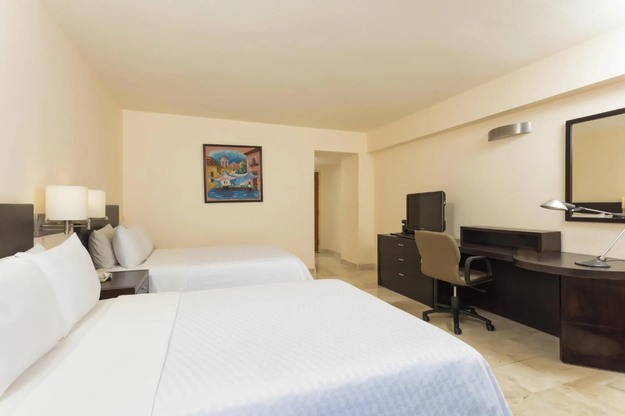 Photo of the whole room, Bed in Fiesta Inn Veracruz Boca Del Rio