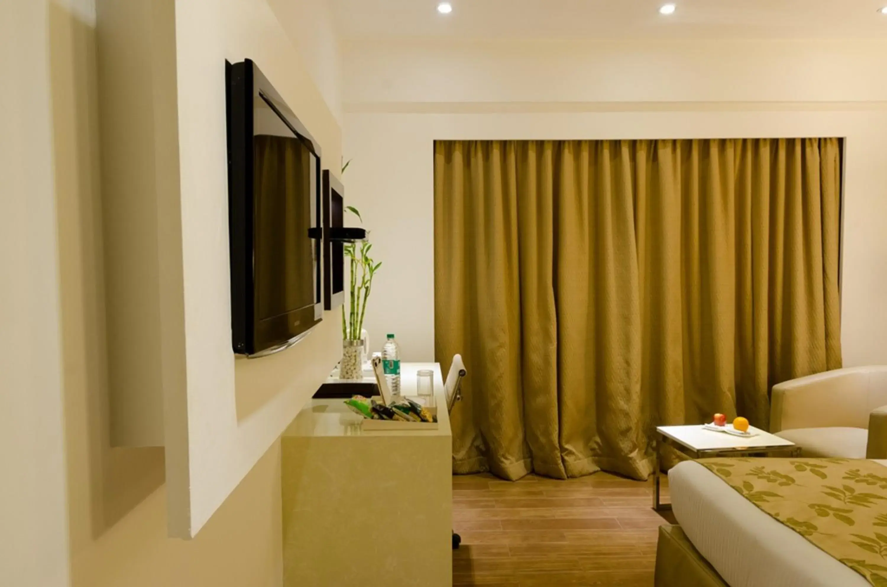 Bedroom, Bed in Ramee Grand Hotel and Spa, Pune Bedroom, Bed in Ramee Grand Hotel and Spa, Pune