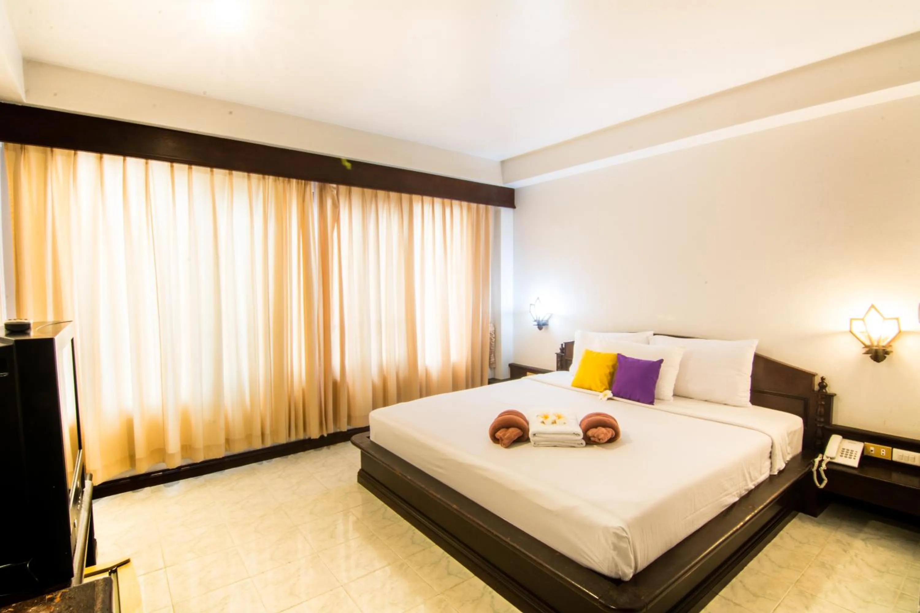 Bed in Samui First House Hotel