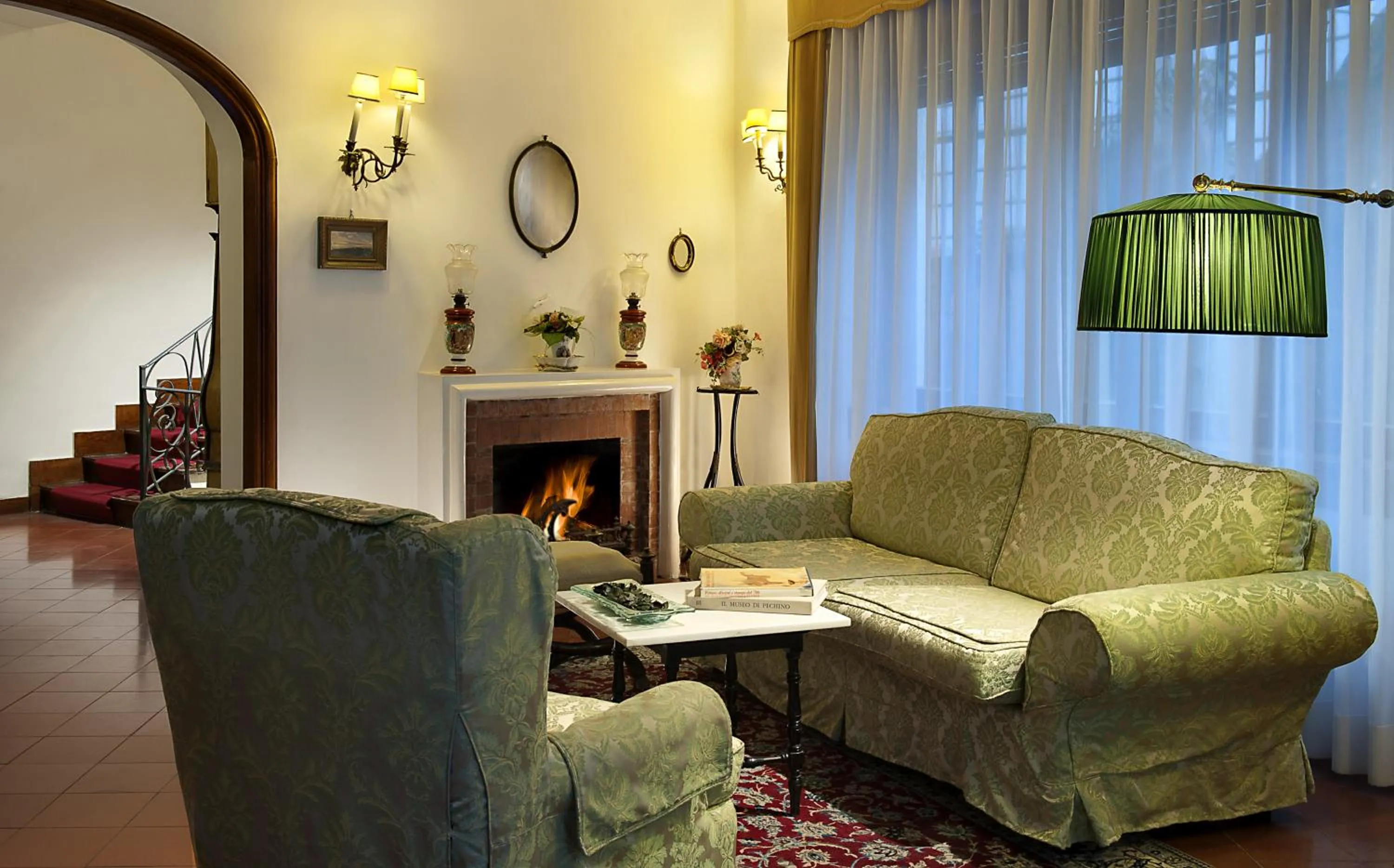 Communal lounge/ TV room in Hotel La Villarosa Terme